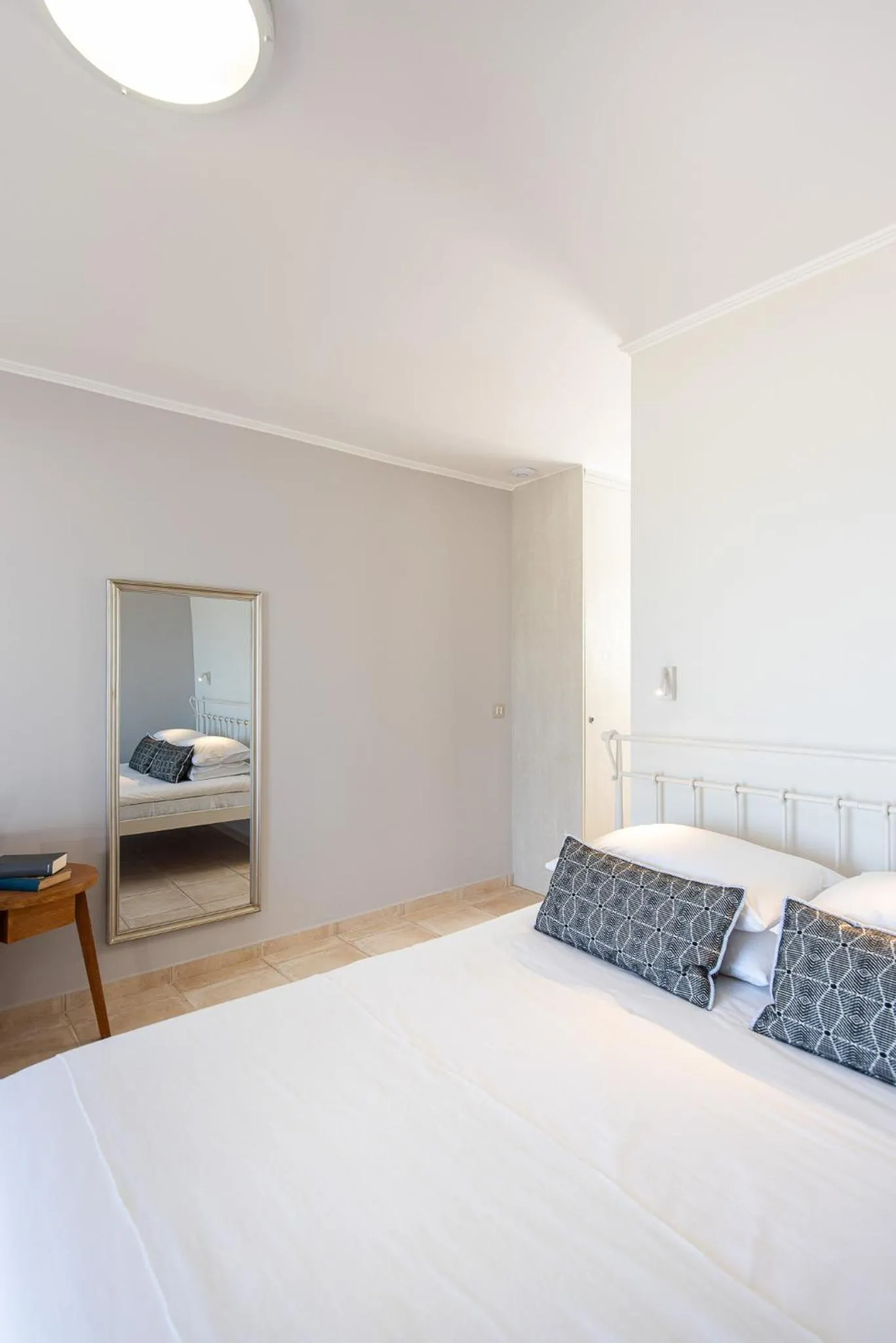 Bed in The Mini Beach Hotel