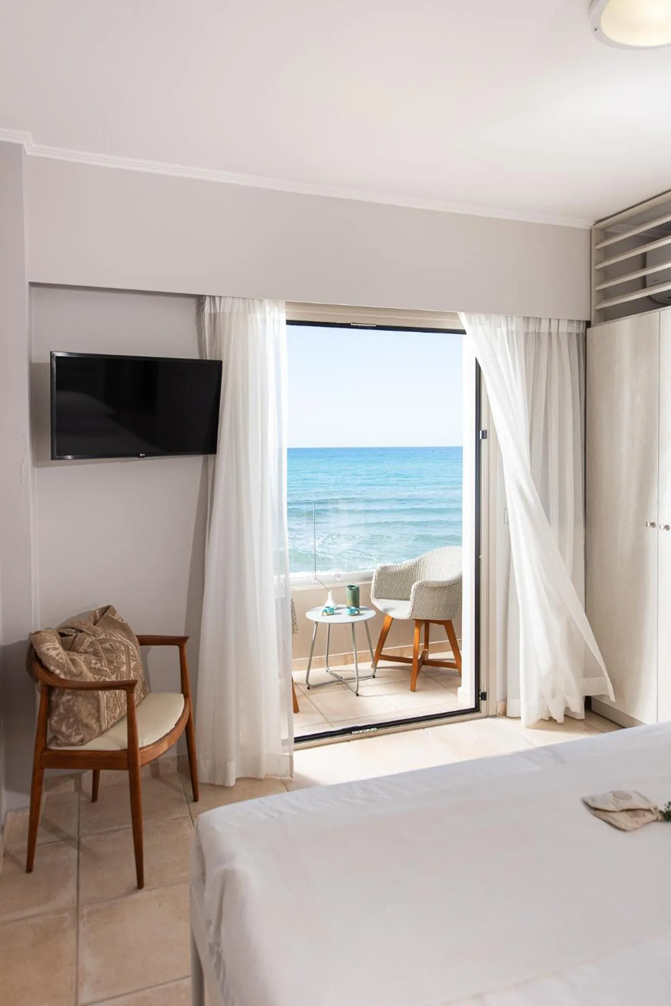 View (from property/room), Bed in The Mini Beach Hotel