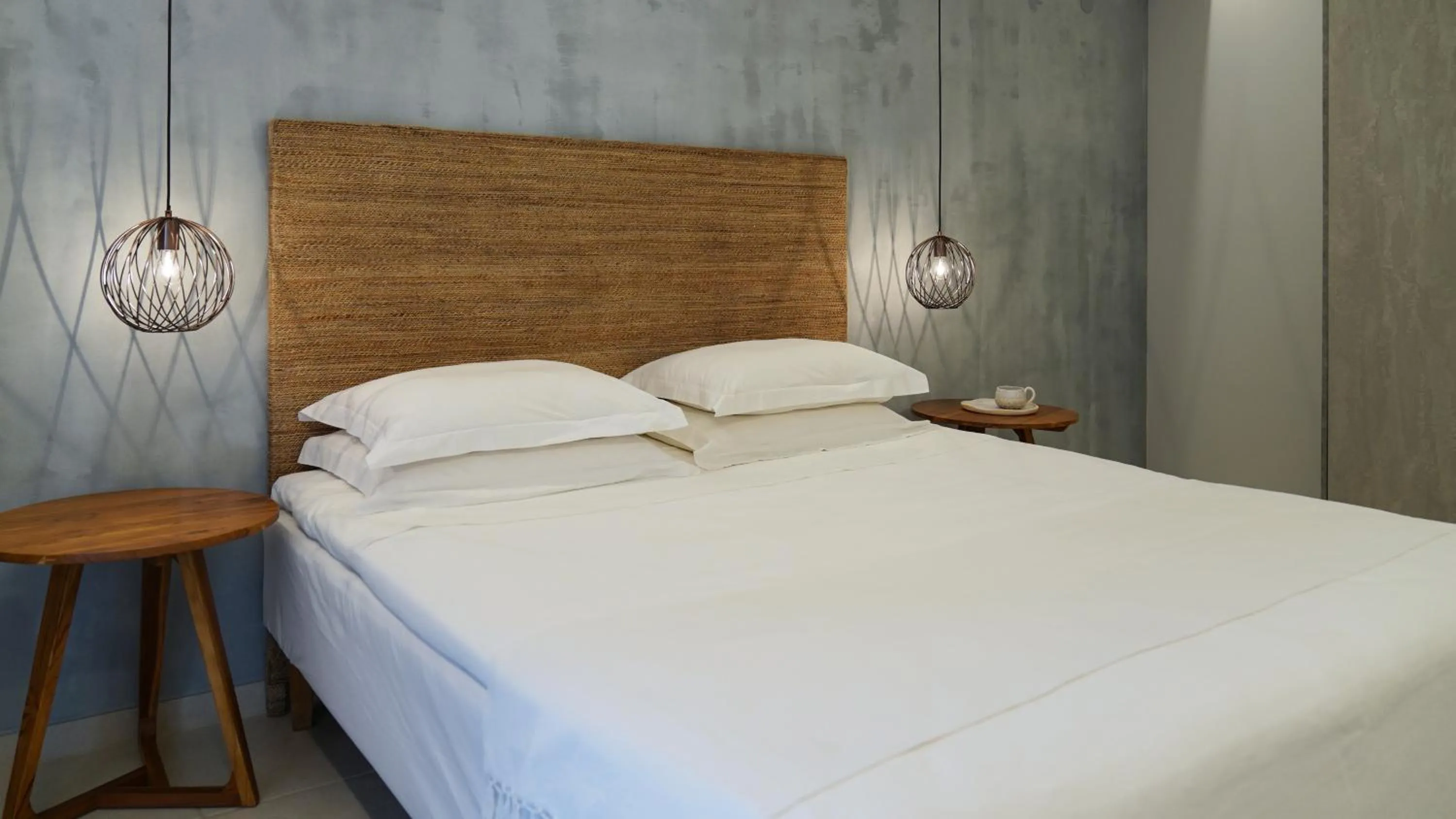 Bed in The Mini Beach Hotel