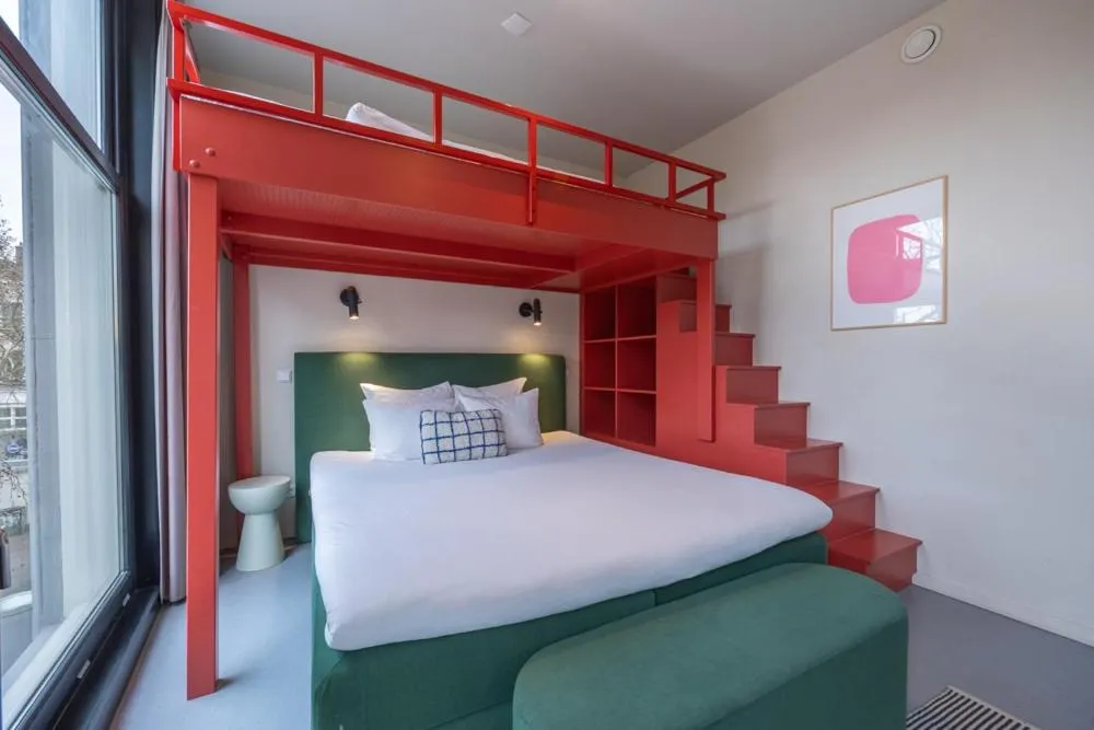 Bed in hotel emma next