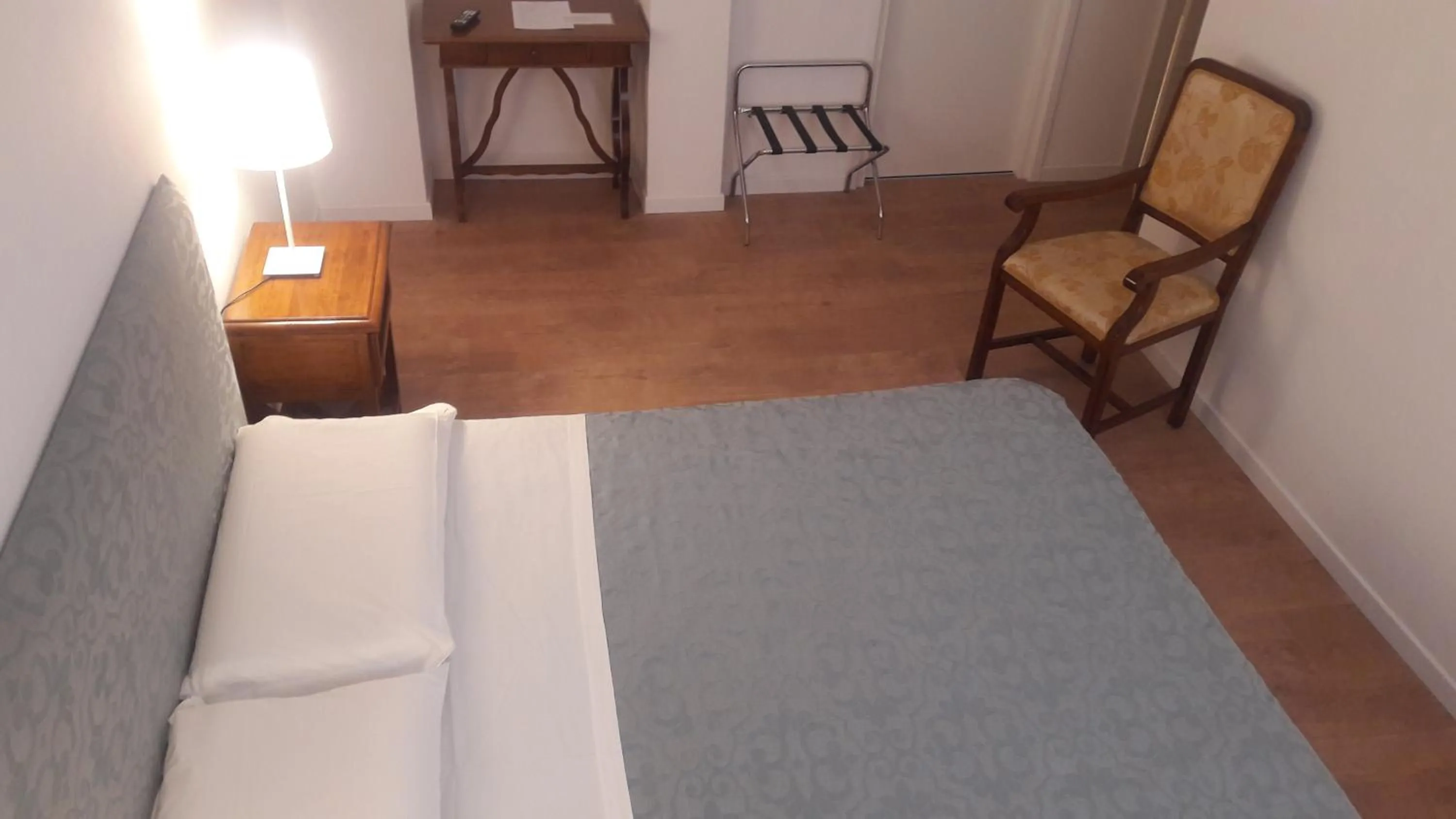 Bed in Il Grifo Camere e Suites