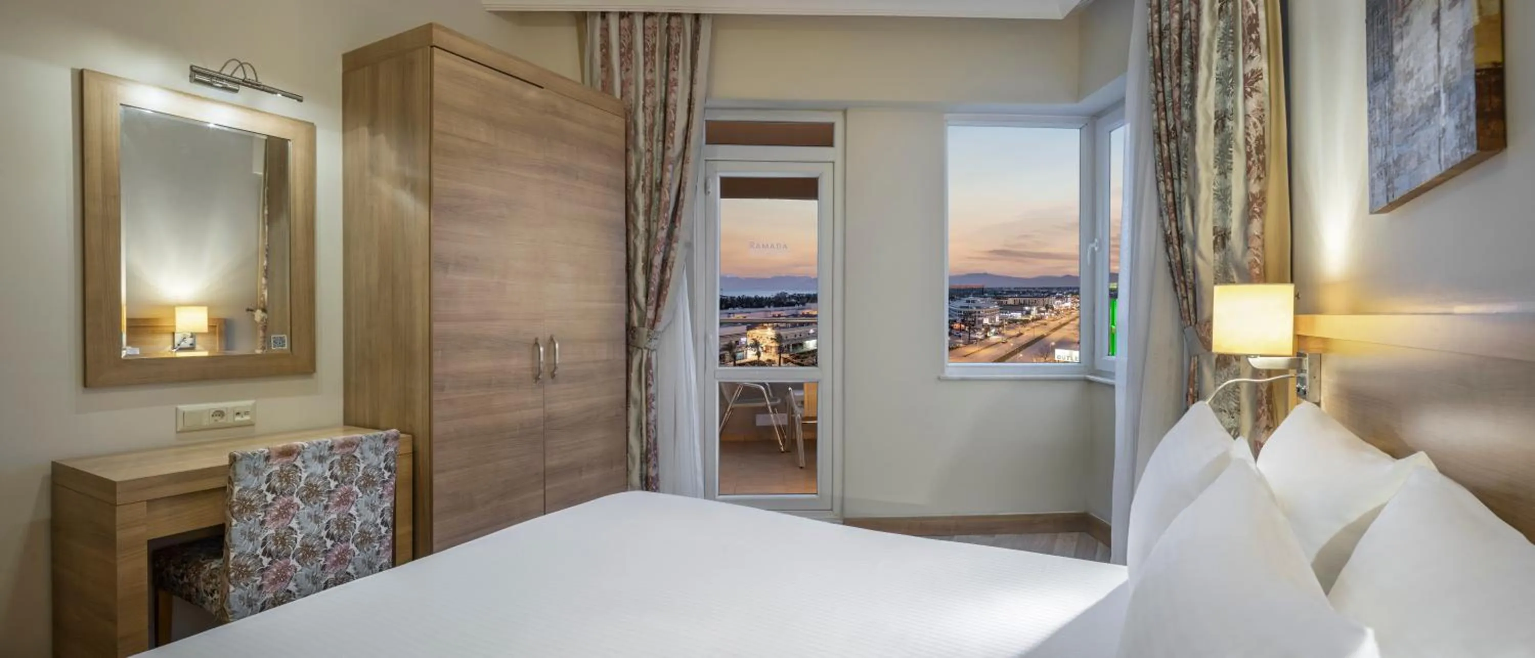 Bed in Ramada Resort By Wyndham Lara