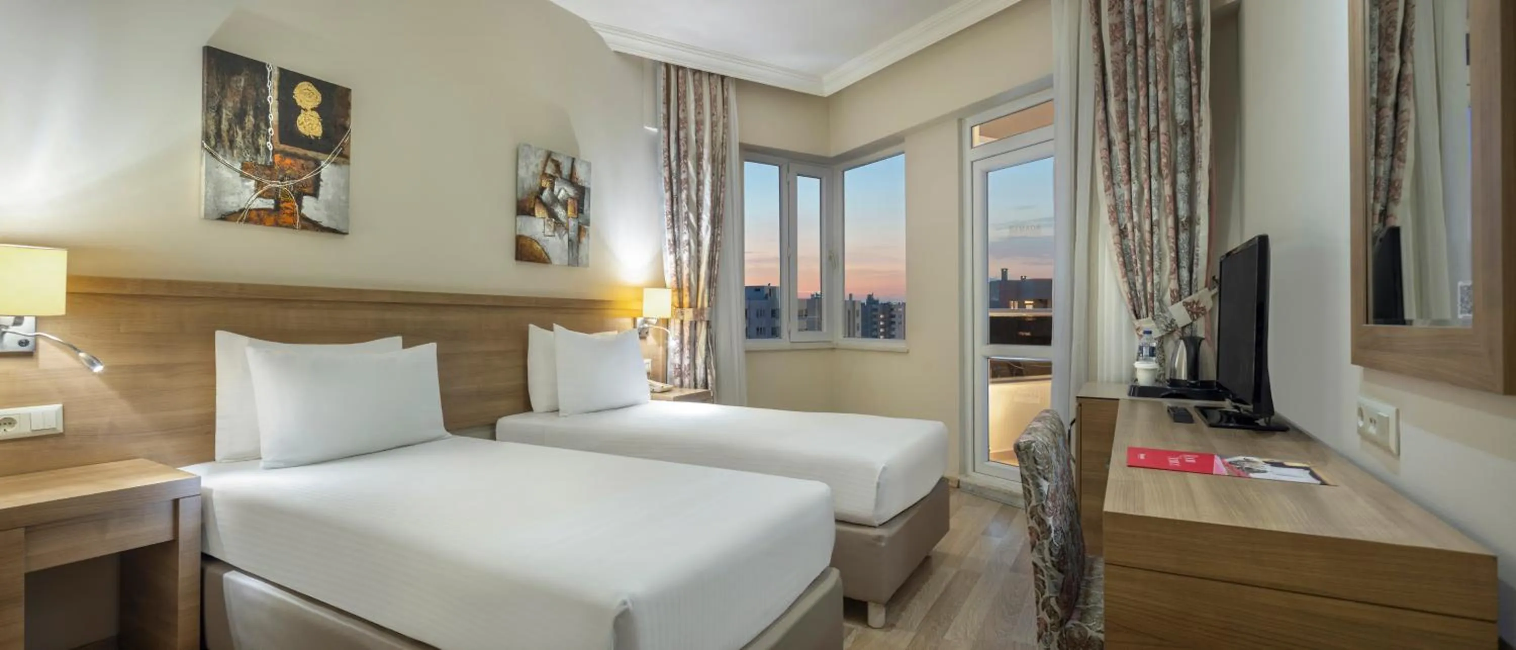 Bed in Ramada Resort By Wyndham Lara