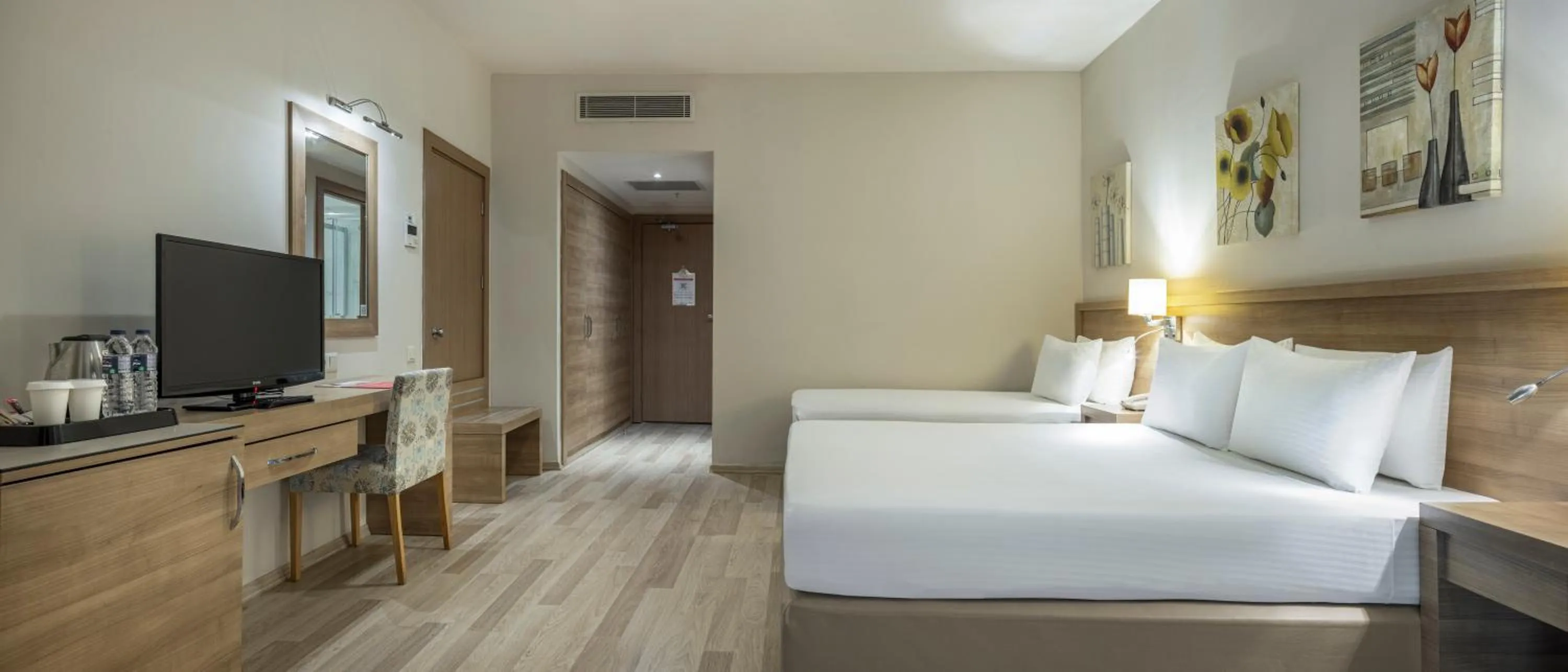 Bed in Ramada Resort By Wyndham Lara