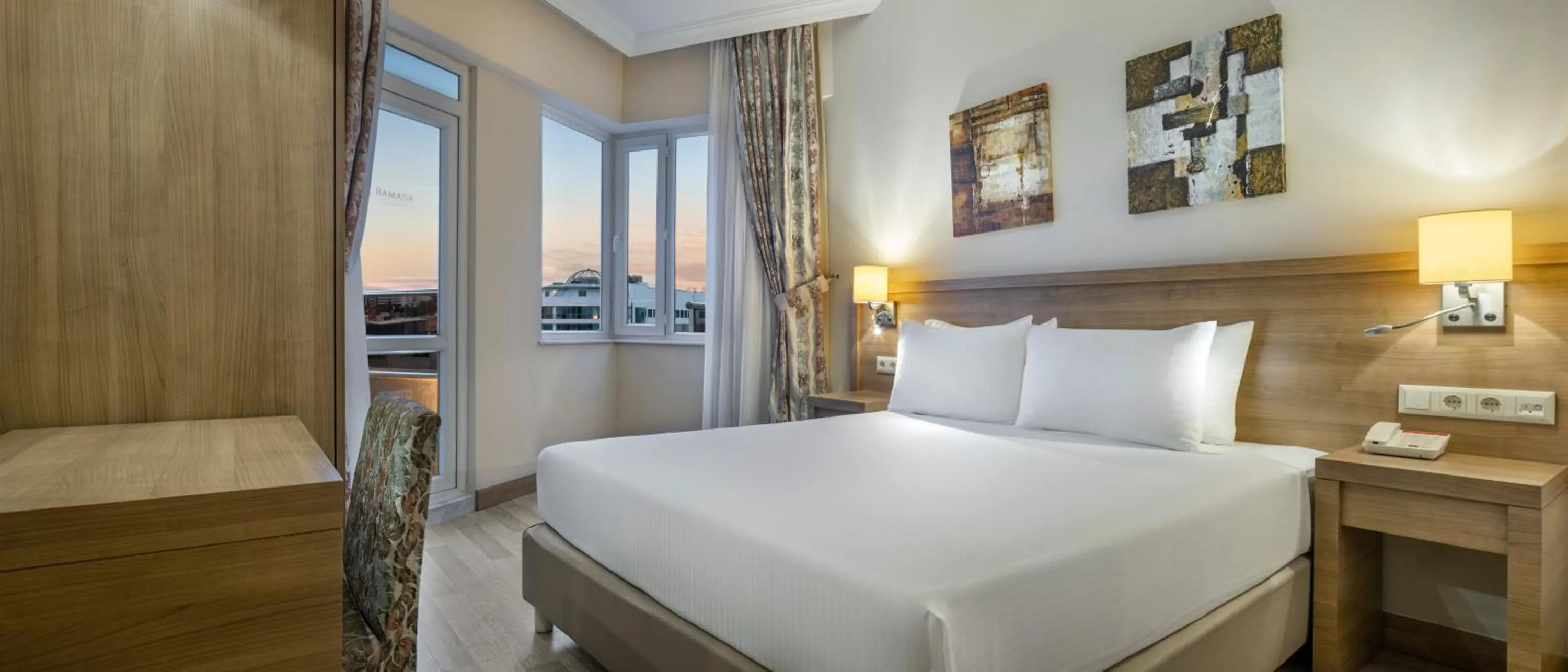 Bed in Ramada Resort By Wyndham Lara