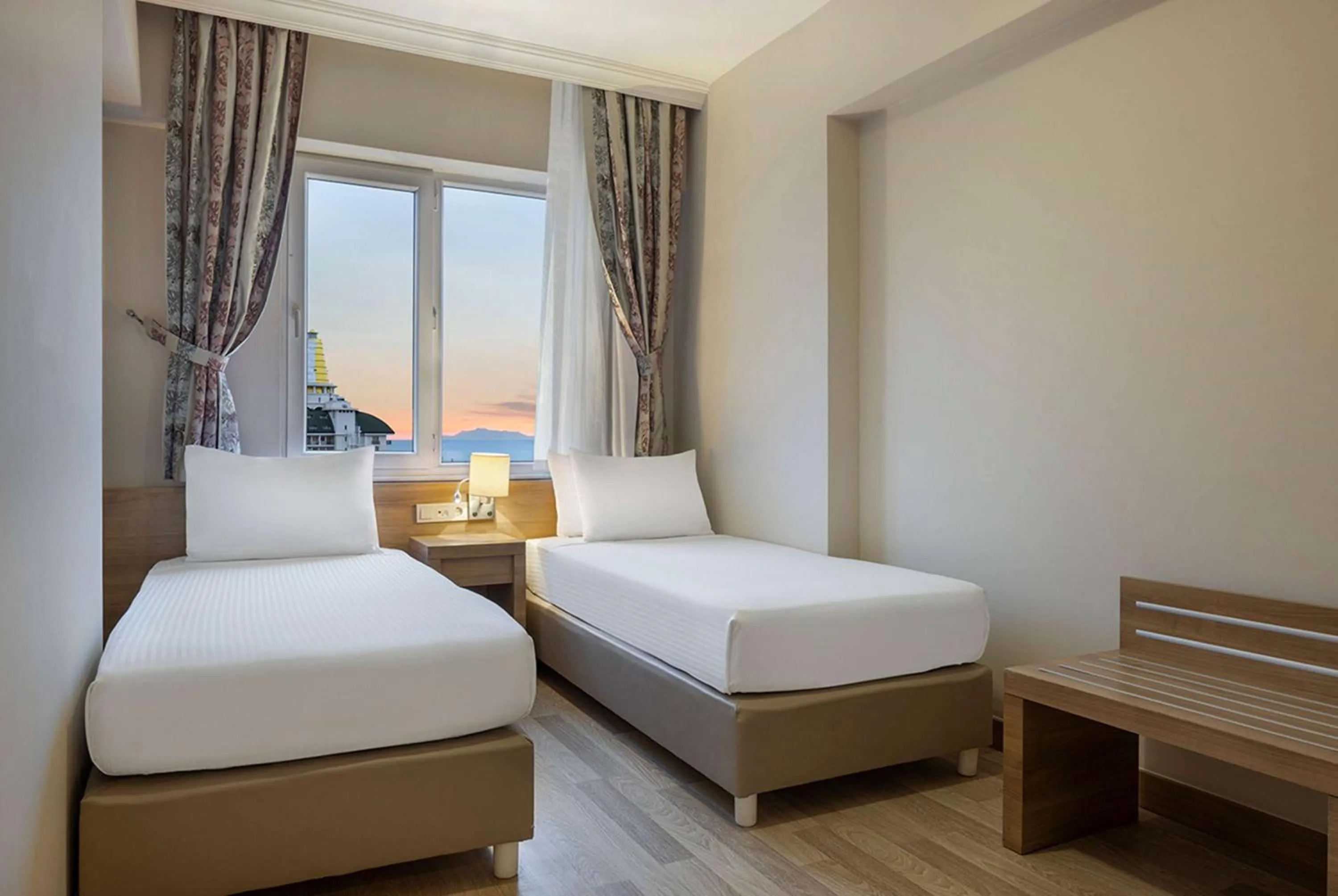 Photo of the whole room, Bed in Ramada Resort By Wyndham Lara