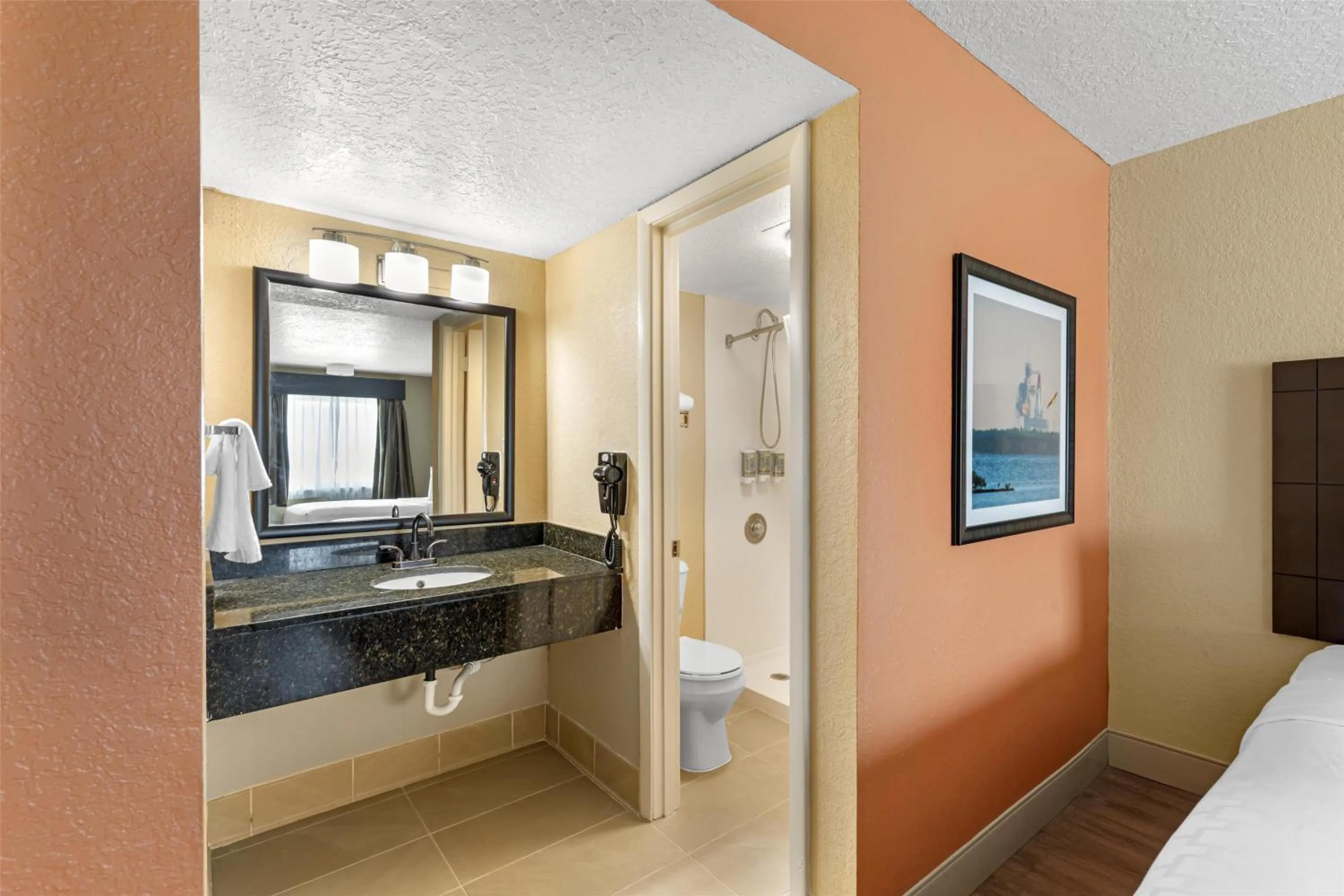 Bathroom, Bed in Best Western Space Shuttle Inn