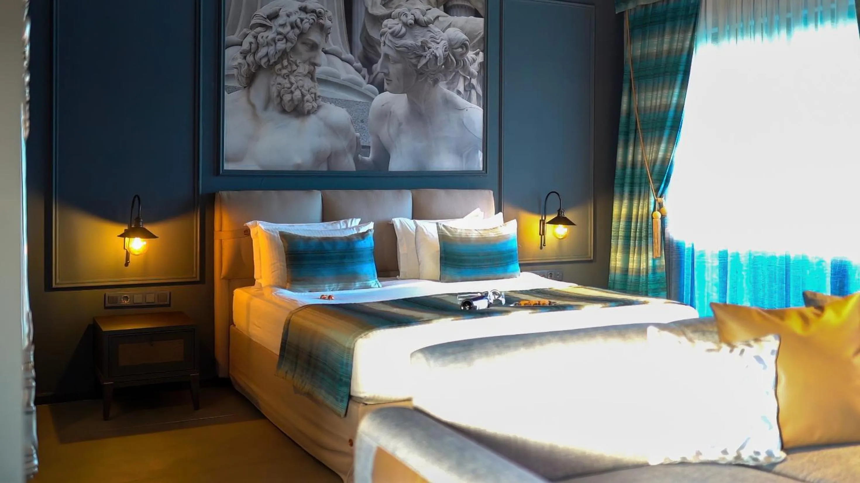 Bed in Sandora Boutiuqe Hotel