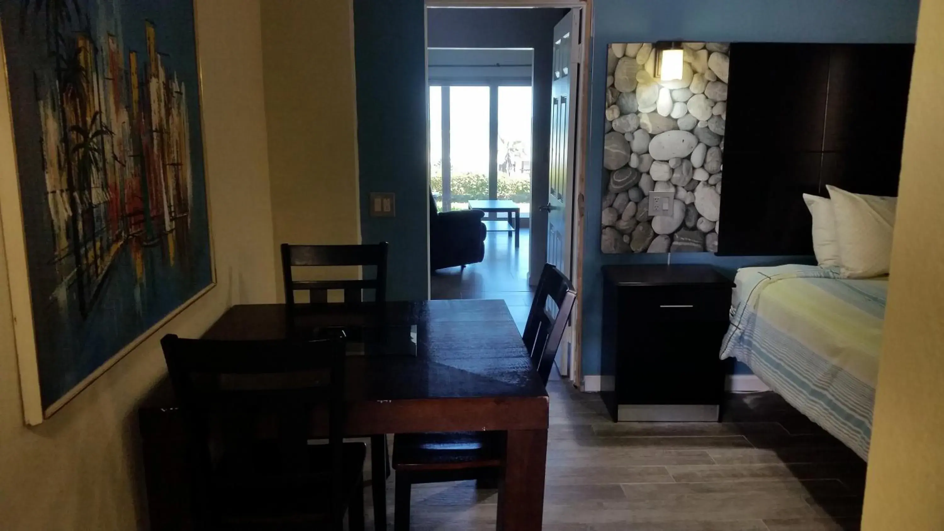 Patio, Bed in Driftwood Beach Motel Patio, Bed in Driftwood Beach Motel