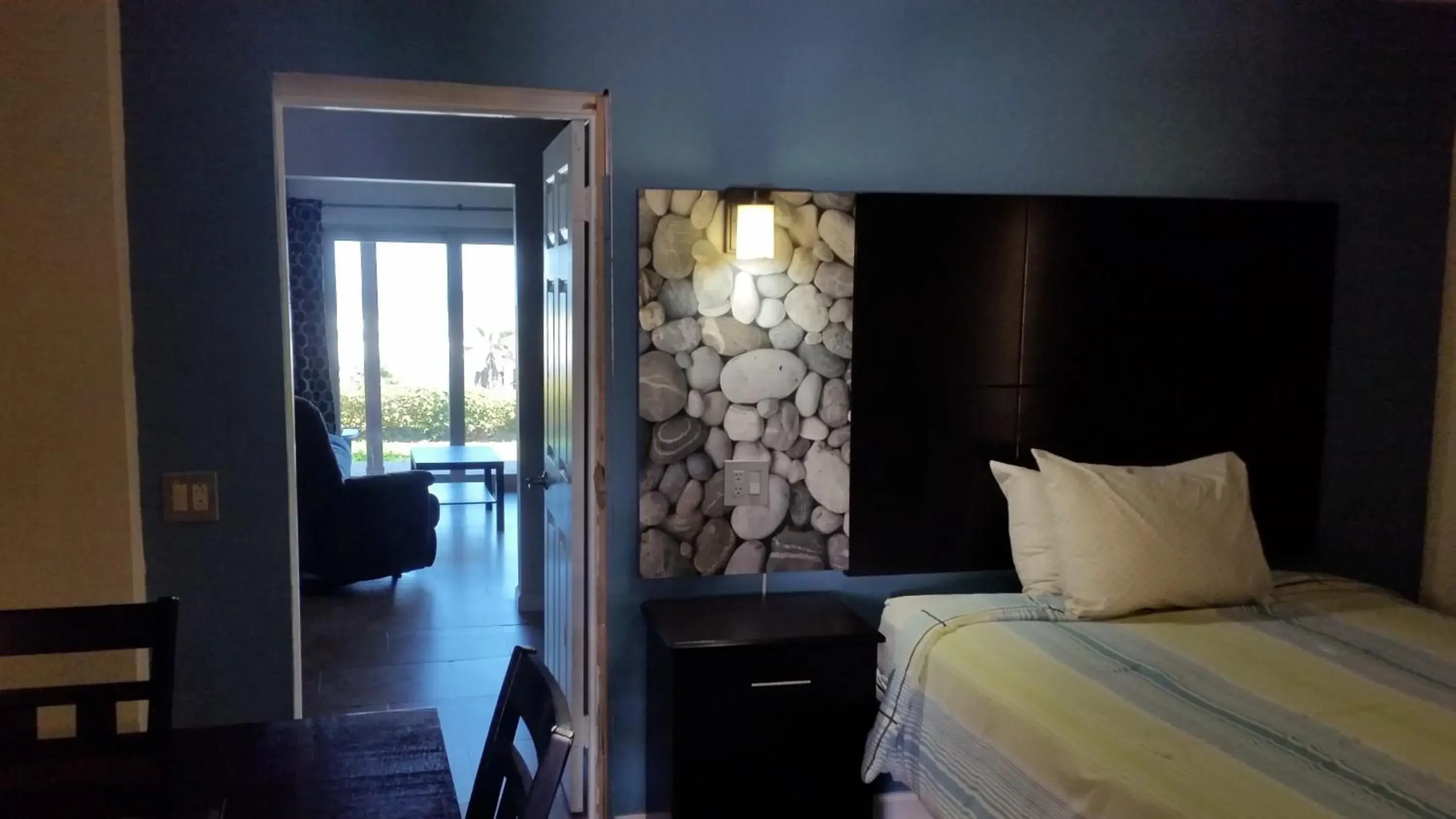 Patio, Bed in Driftwood Beach Motel Patio, Bed in Driftwood Beach Motel