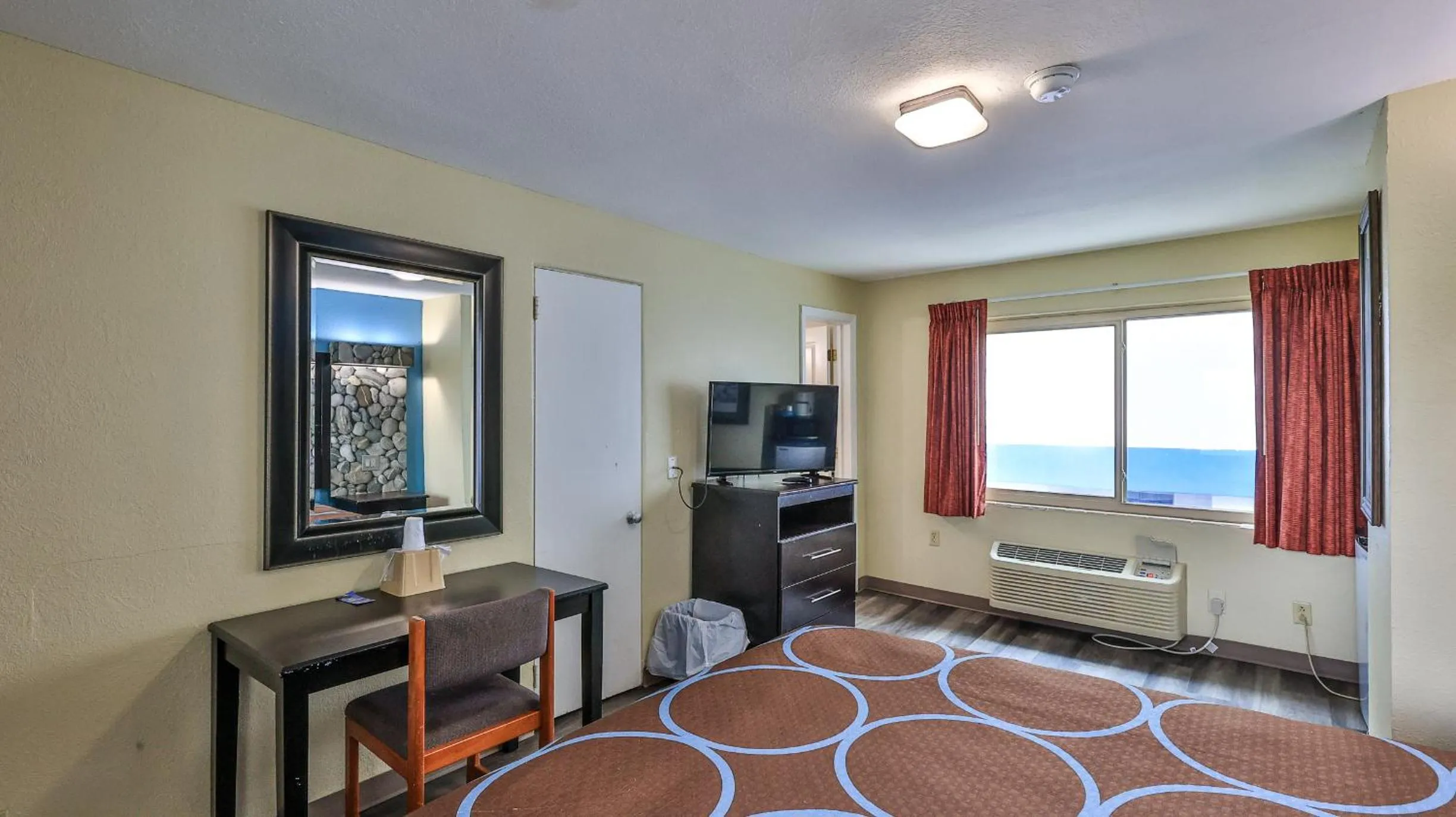 Bed in Driftwood Beach Motel