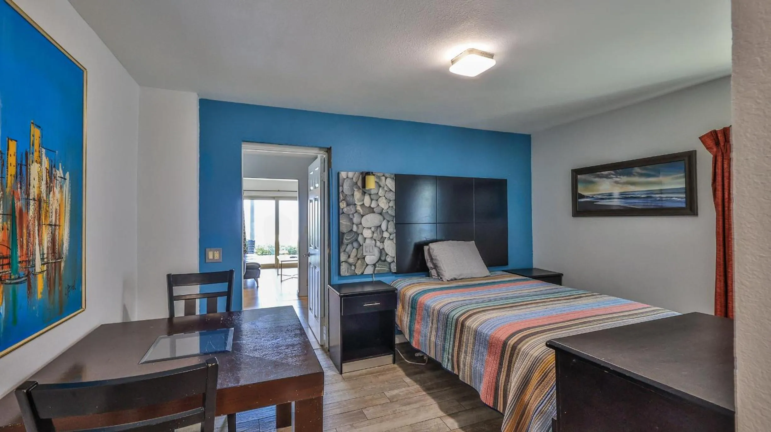 Bed in Driftwood Beach Motel