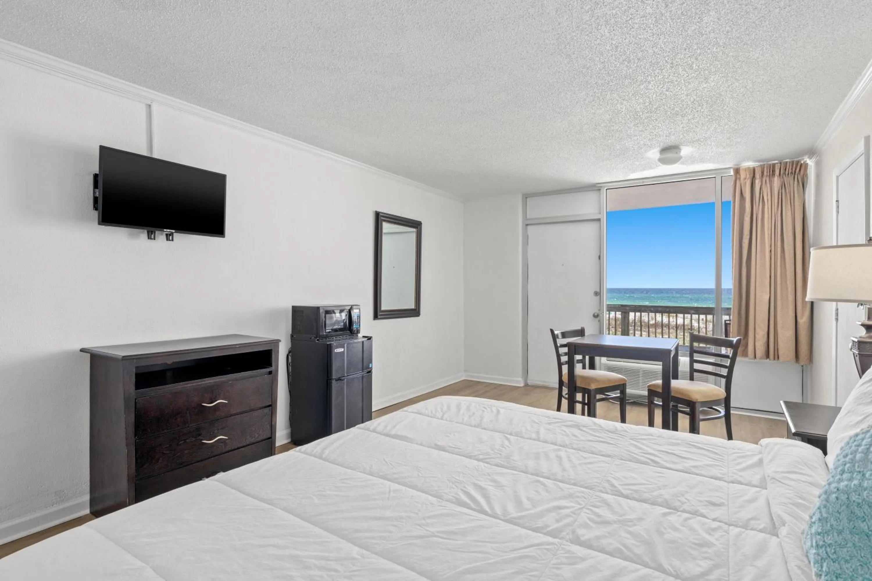 Photo of the whole room, Bed in The Reef At Seahaven Beach Resorts