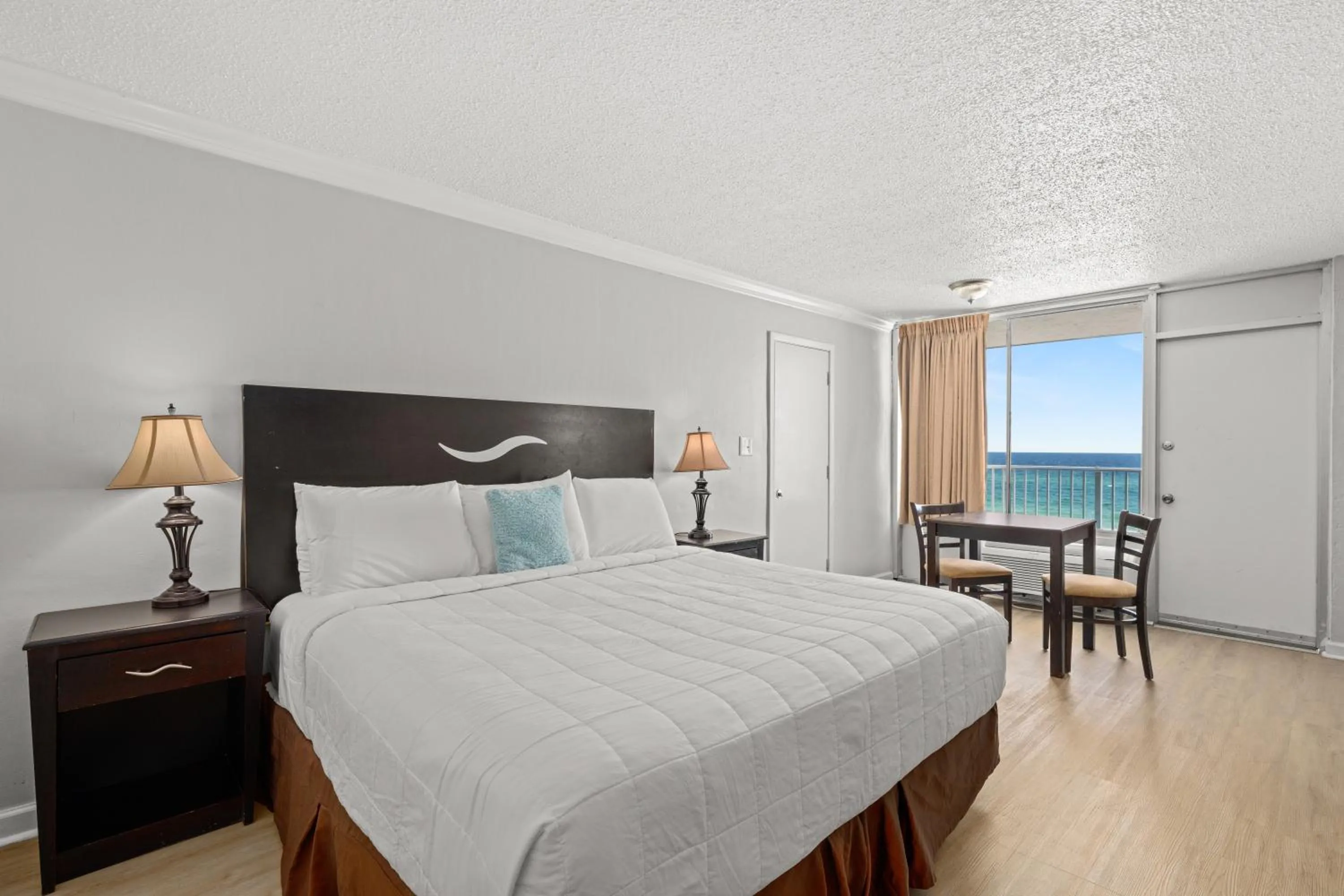 Photo of the whole room, Bed in The Reef At Seahaven Beach Resorts