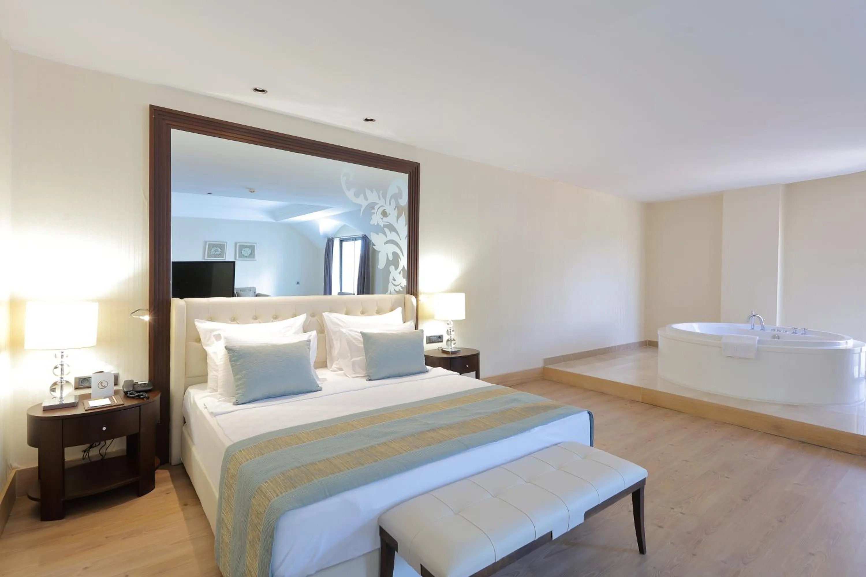 Bed in Juju Premier Palace Hotel