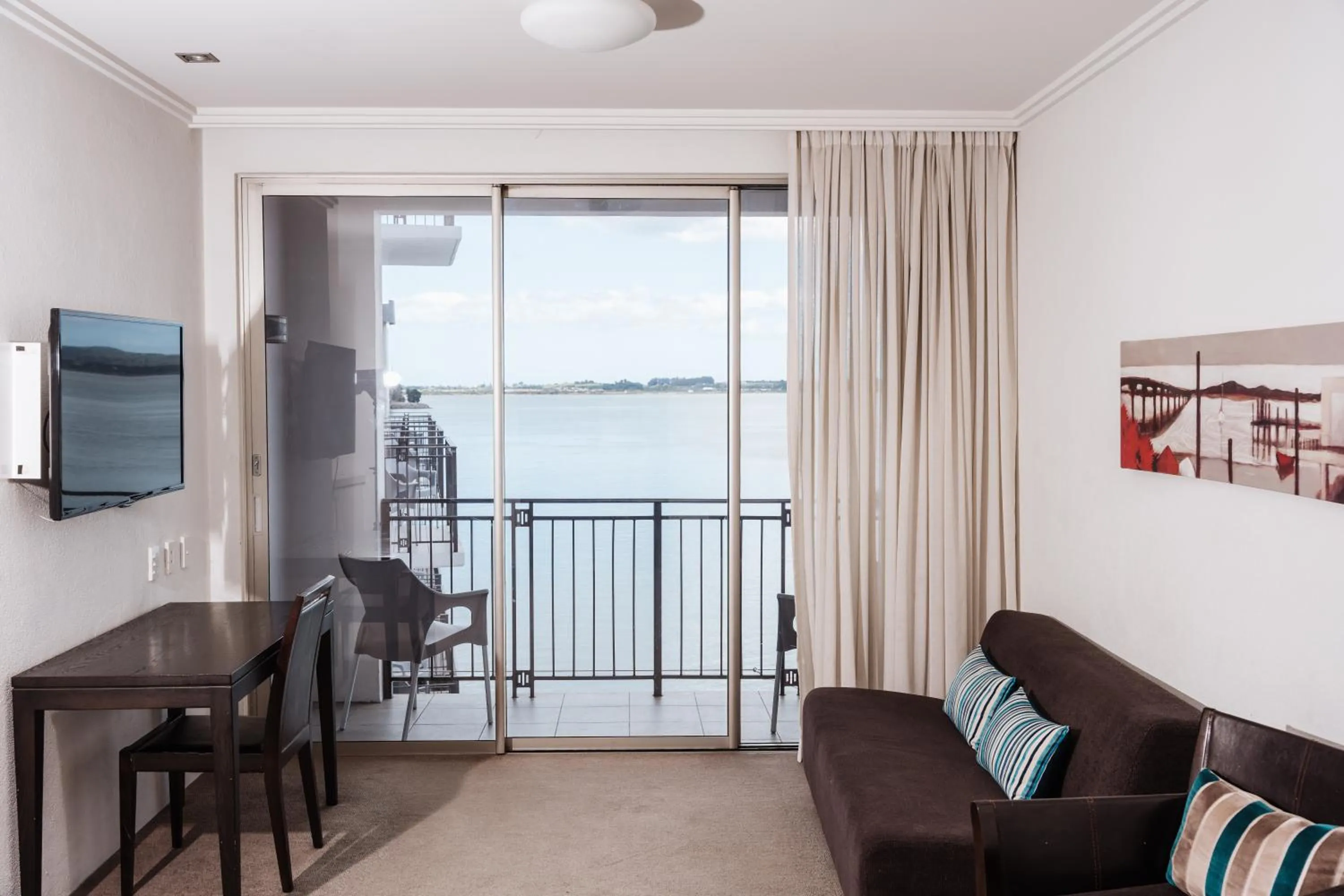 Communal lounge/ TV room in Trinity Wharf Tauranga