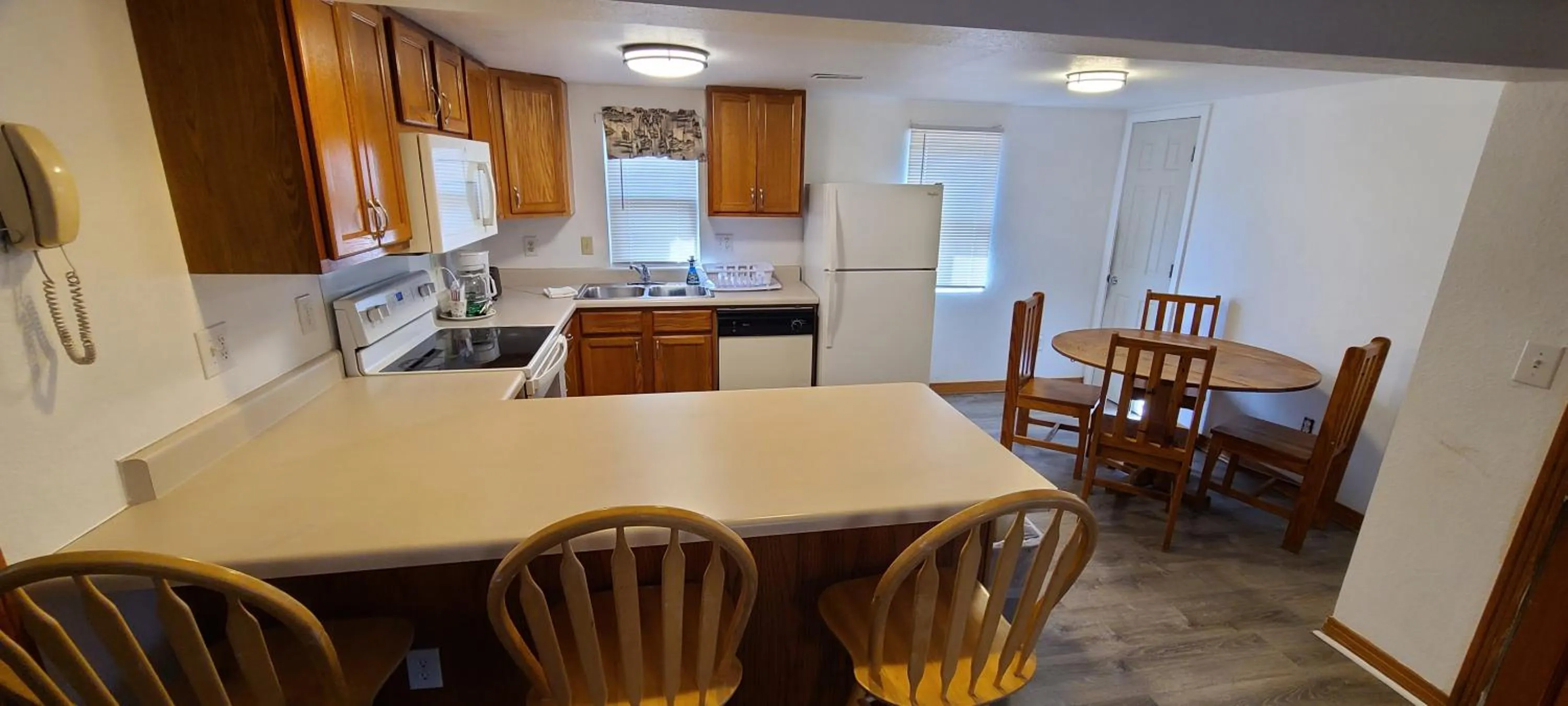 Kitchen or kitchenette in Driftin Sands Motel