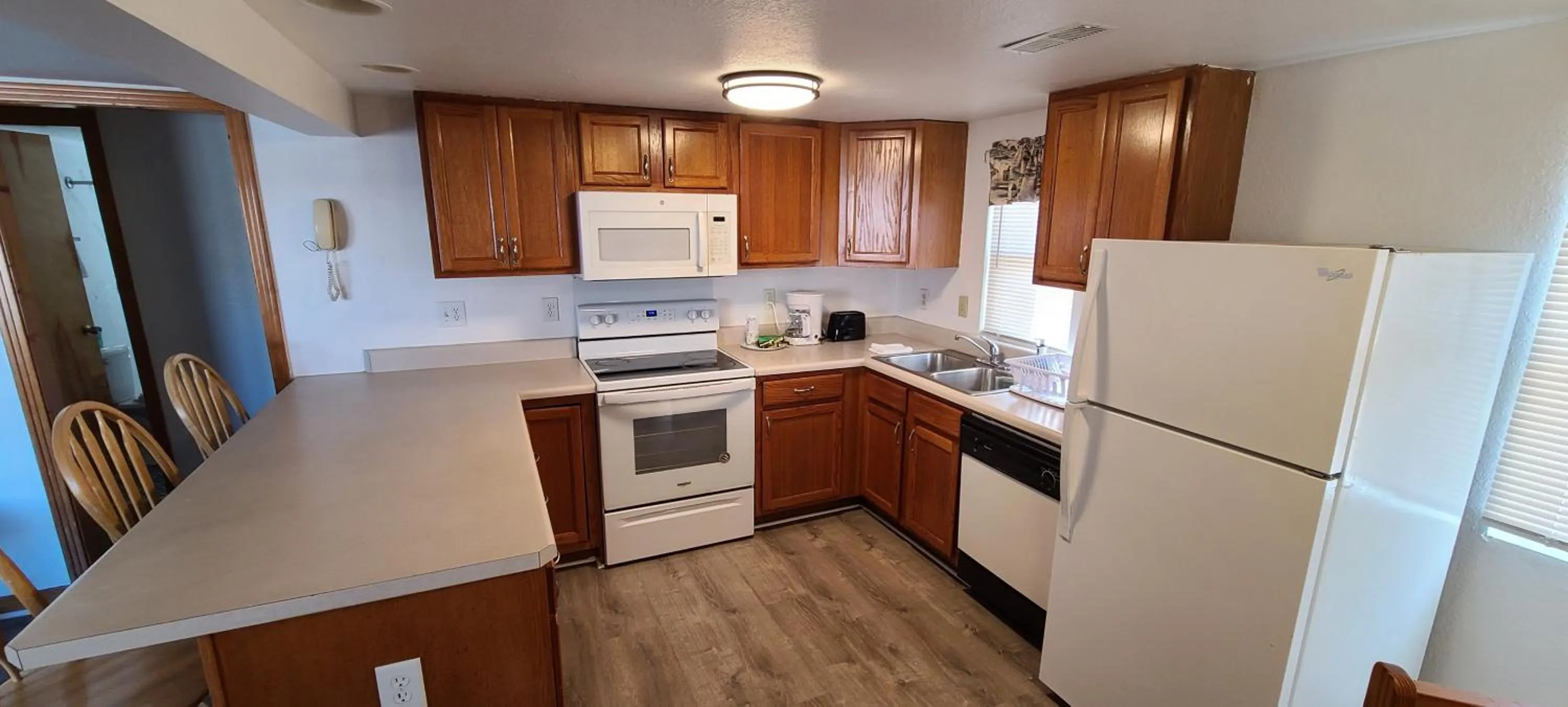 Kitchen or kitchenette in Driftin Sands Motel