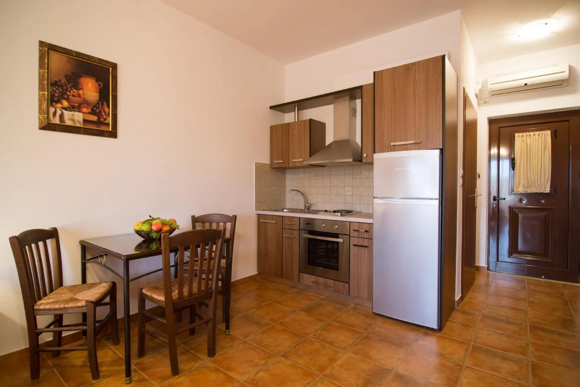 kitchen in Vathi Hotel Apartment Hotel