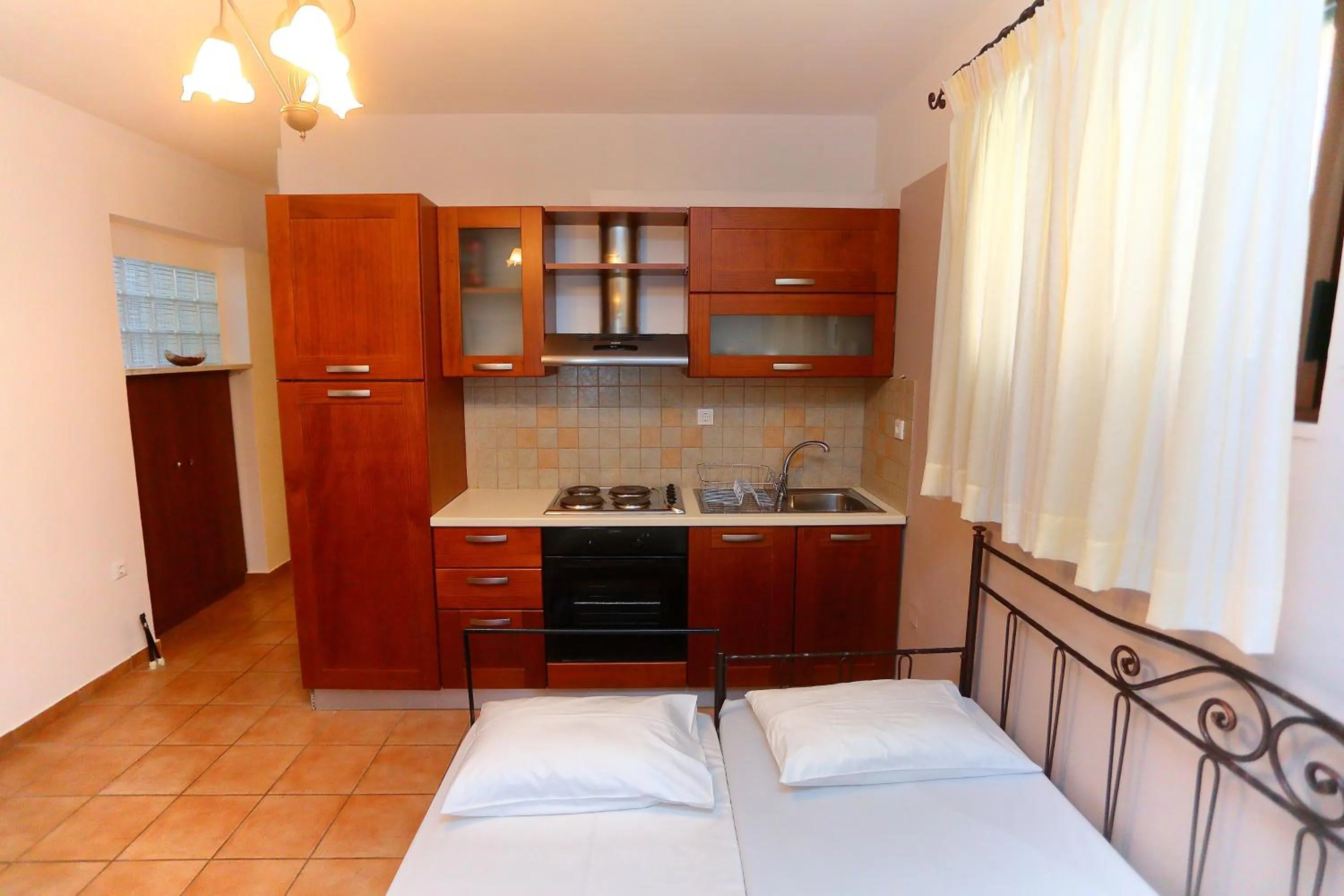 Kitchen or kitchenette in Vathi Hotel Apartment Hotel