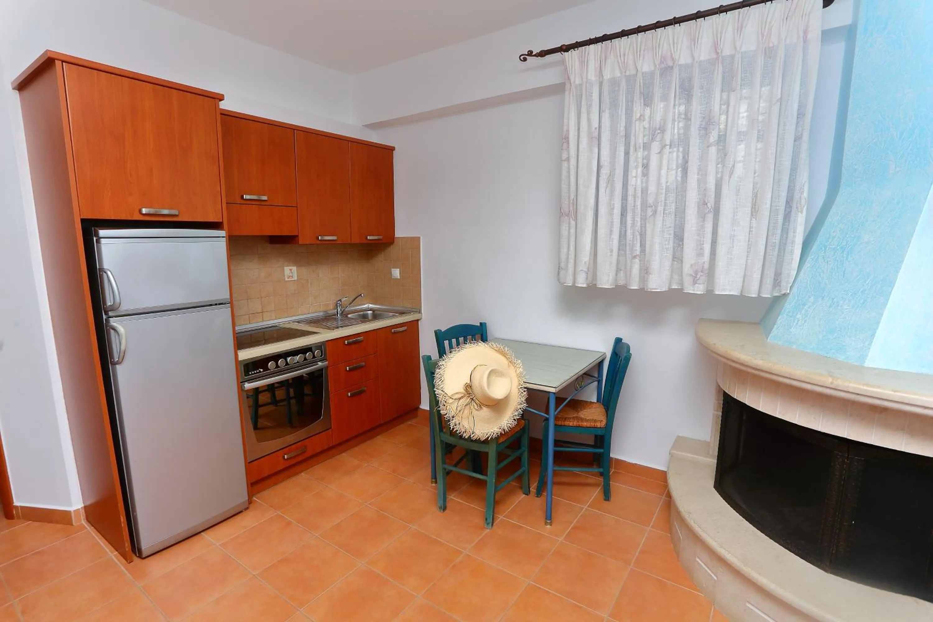 Kitchen or kitchenette in Vathi Hotel Apartment Hotel