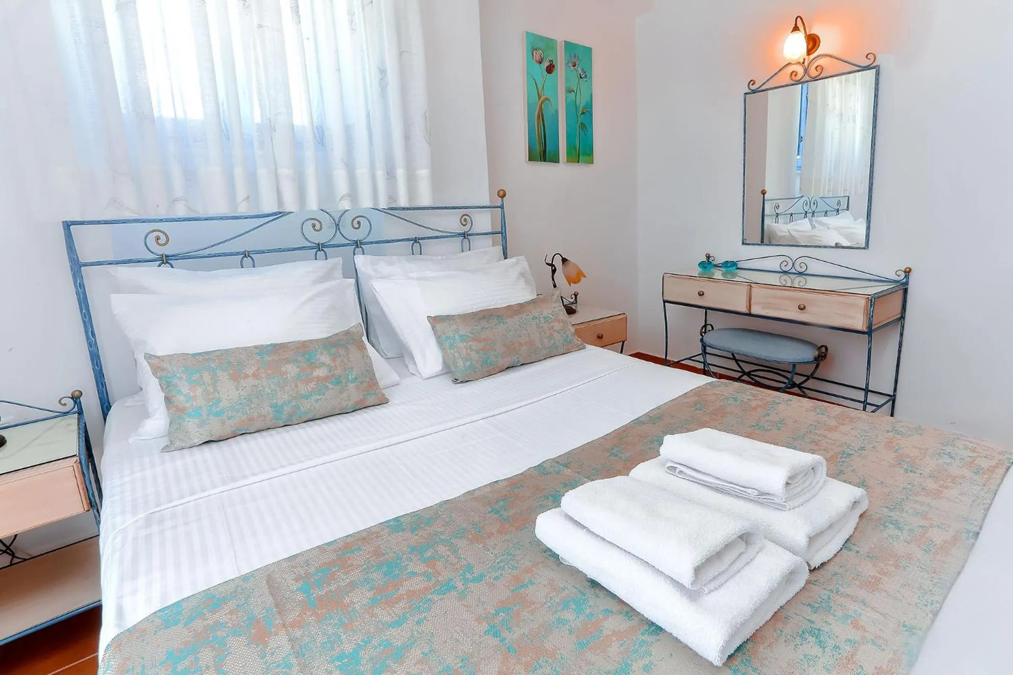 Bed in Vathi Hotel Apartment Hotel