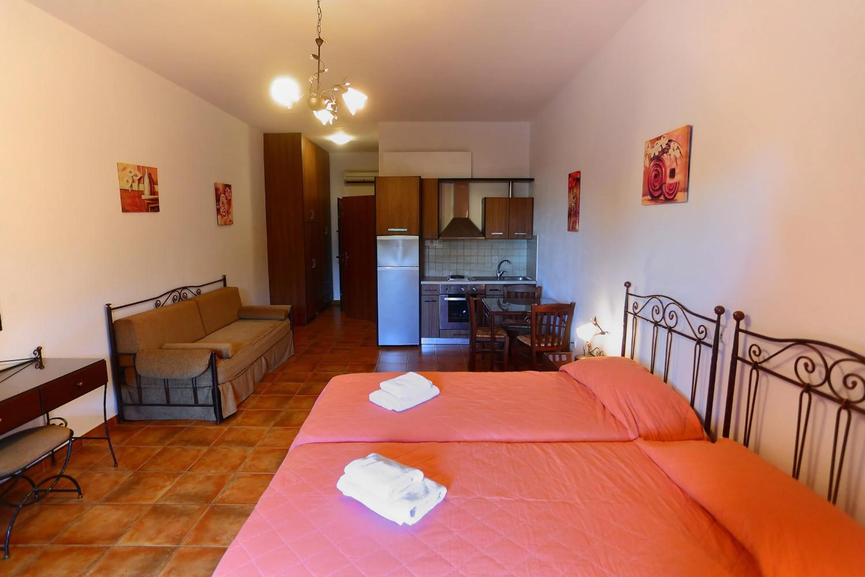 Bed in Vathi Hotel Apartment Hotel