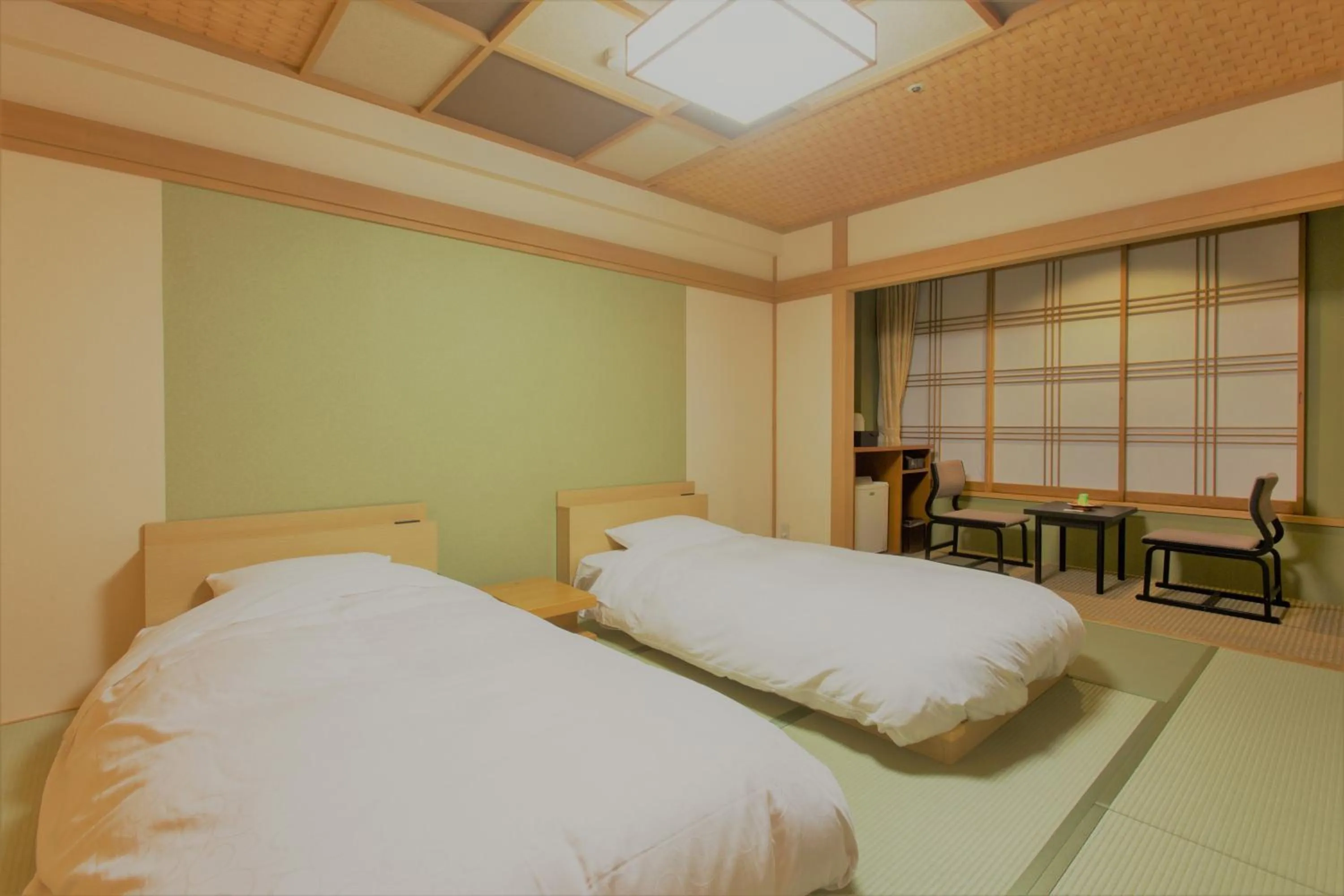 Photo of the whole room, Bed in Ito Kowakien