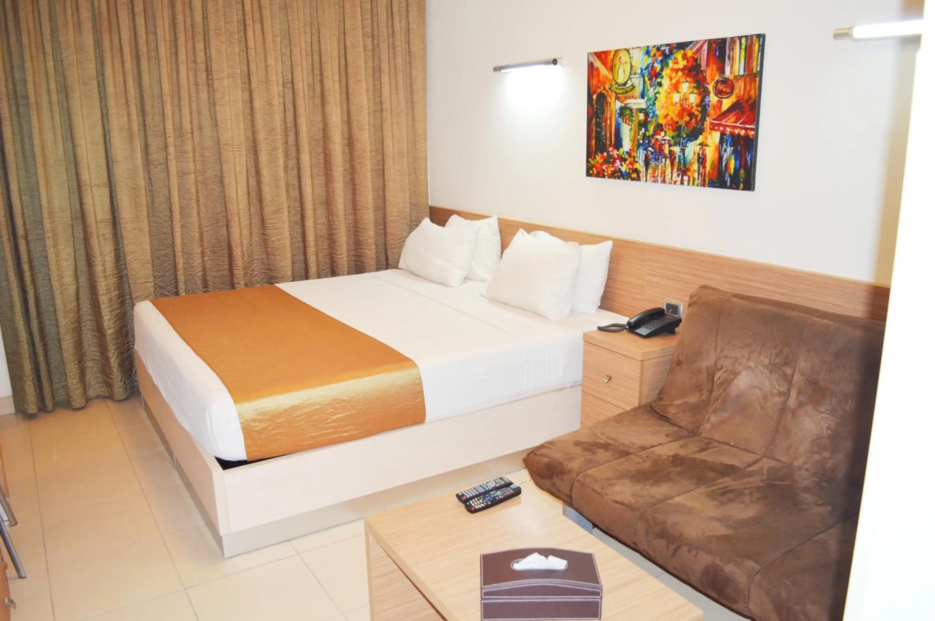 Bed in Hayali Suites