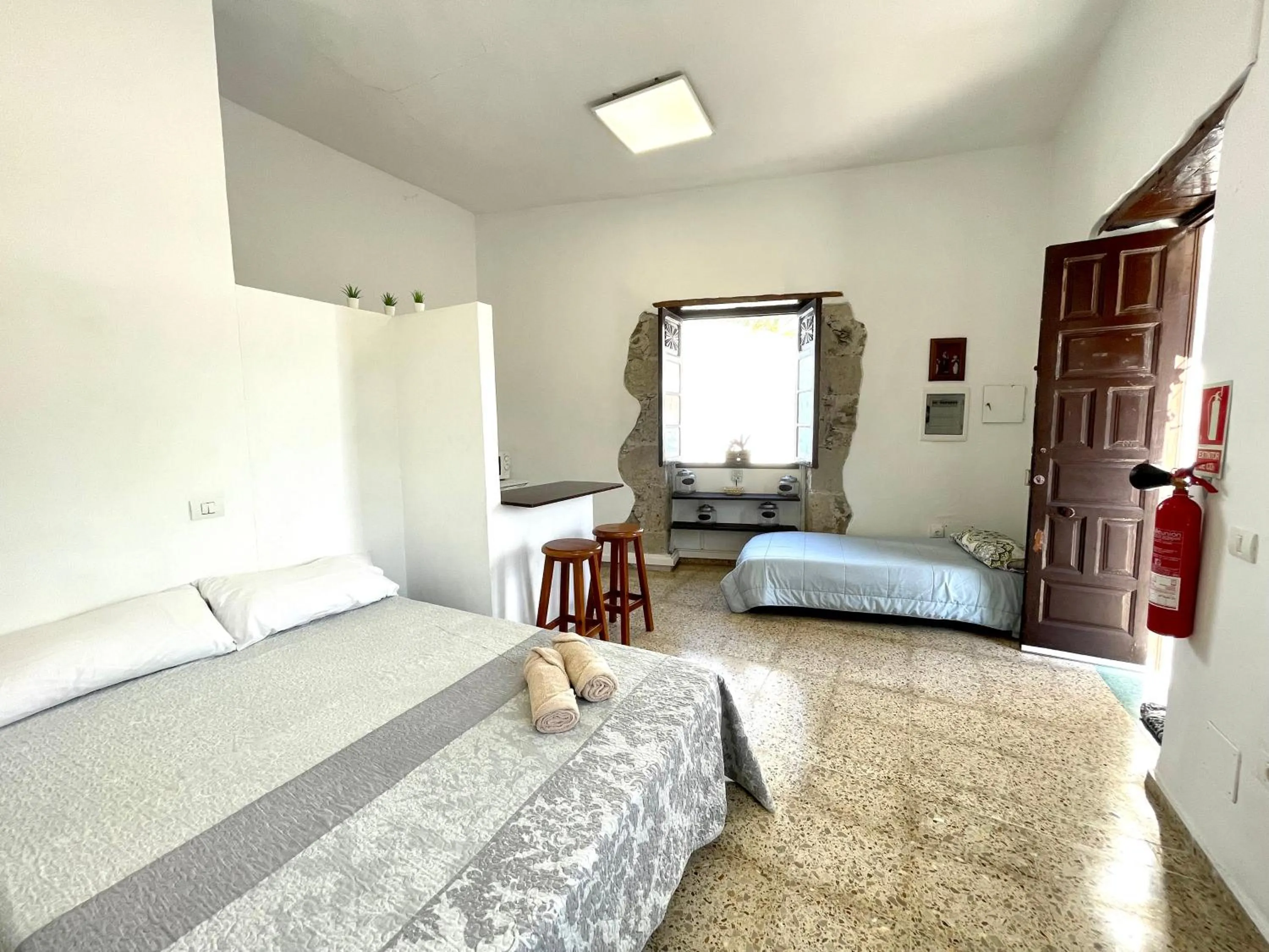 Bed in El Hostal del Cubo