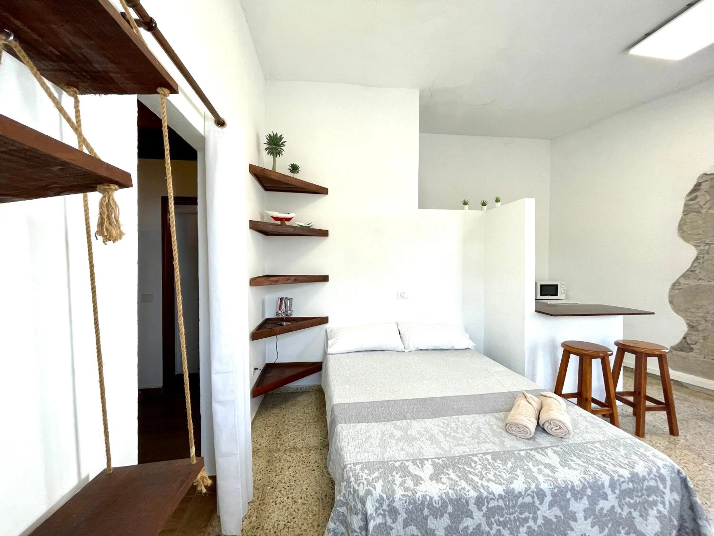 Bed in El Hostal del Cubo