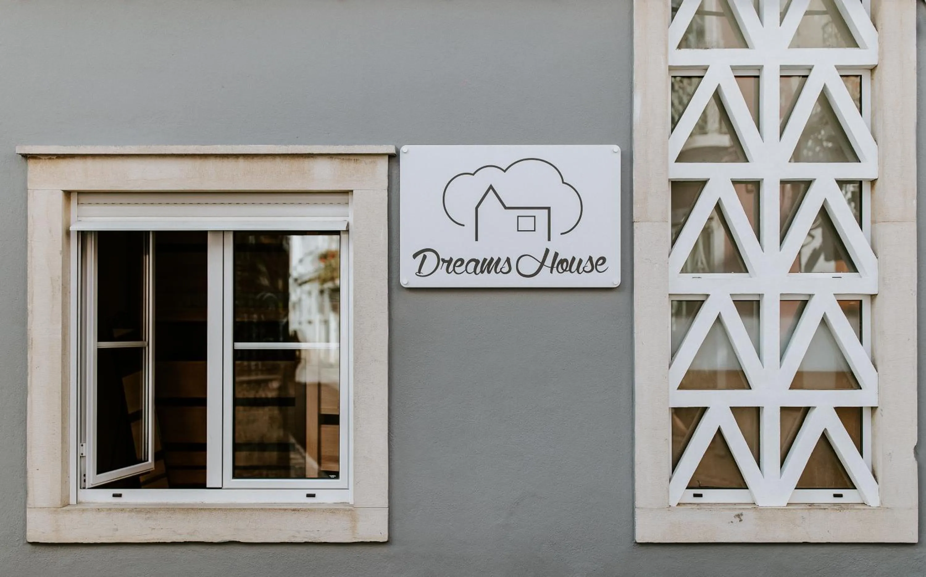 Property logo or sign in DREAMS HOUSE