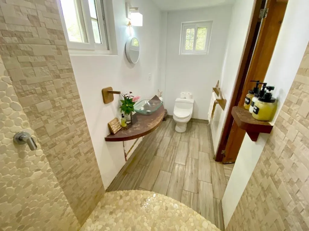 Bathroom in Bird Island Bungalows
