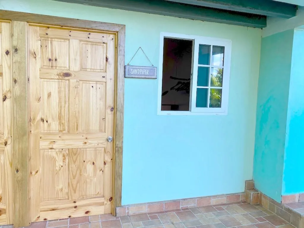 Facade/entrance in Bird Island Bungalows