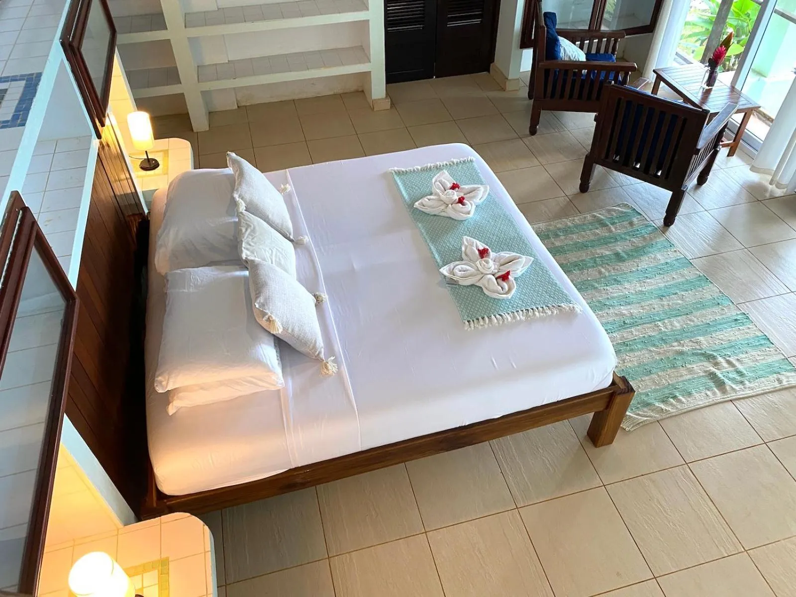 Bed in Bird Island Bungalows