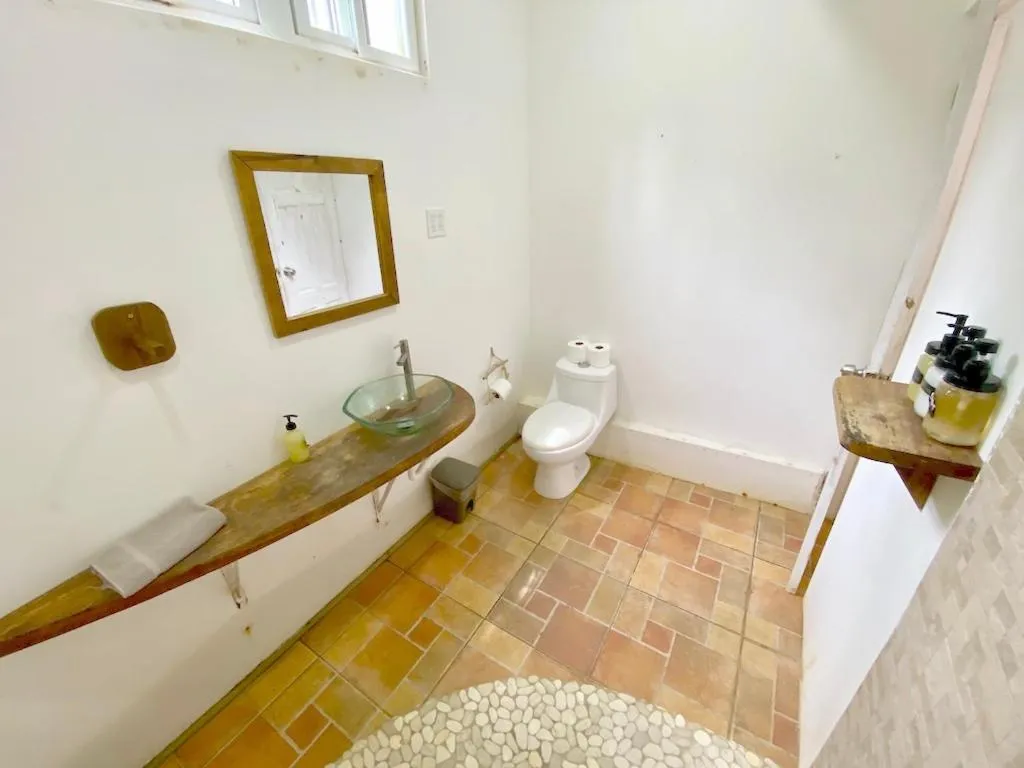 Bathroom in Bird Island Bungalows