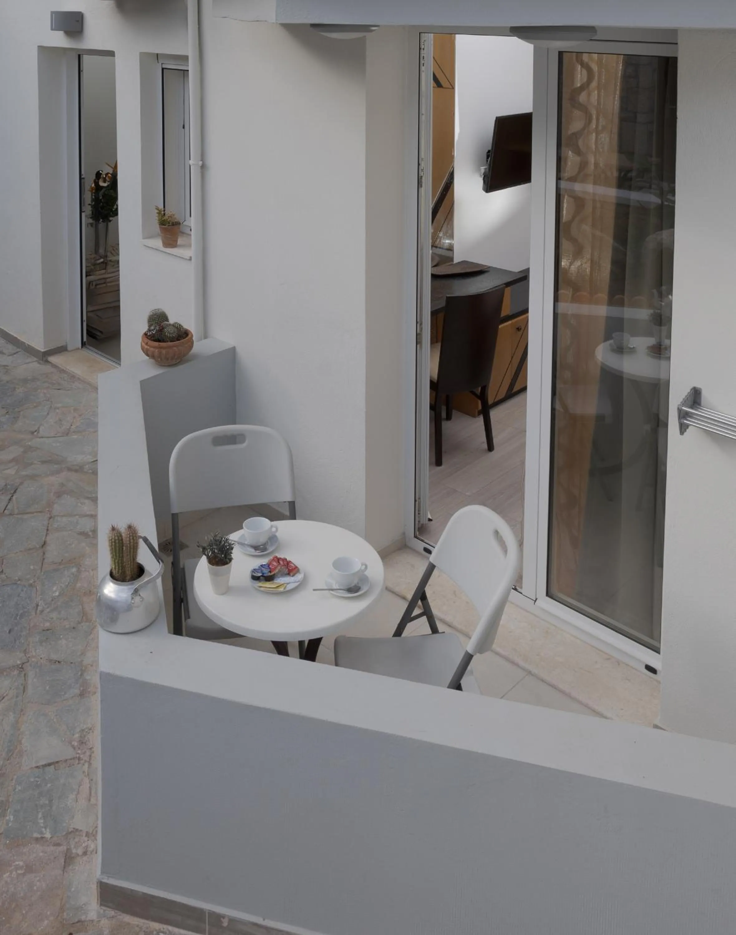 Balcony/Terrace in Camelot Royal Beds by Estia