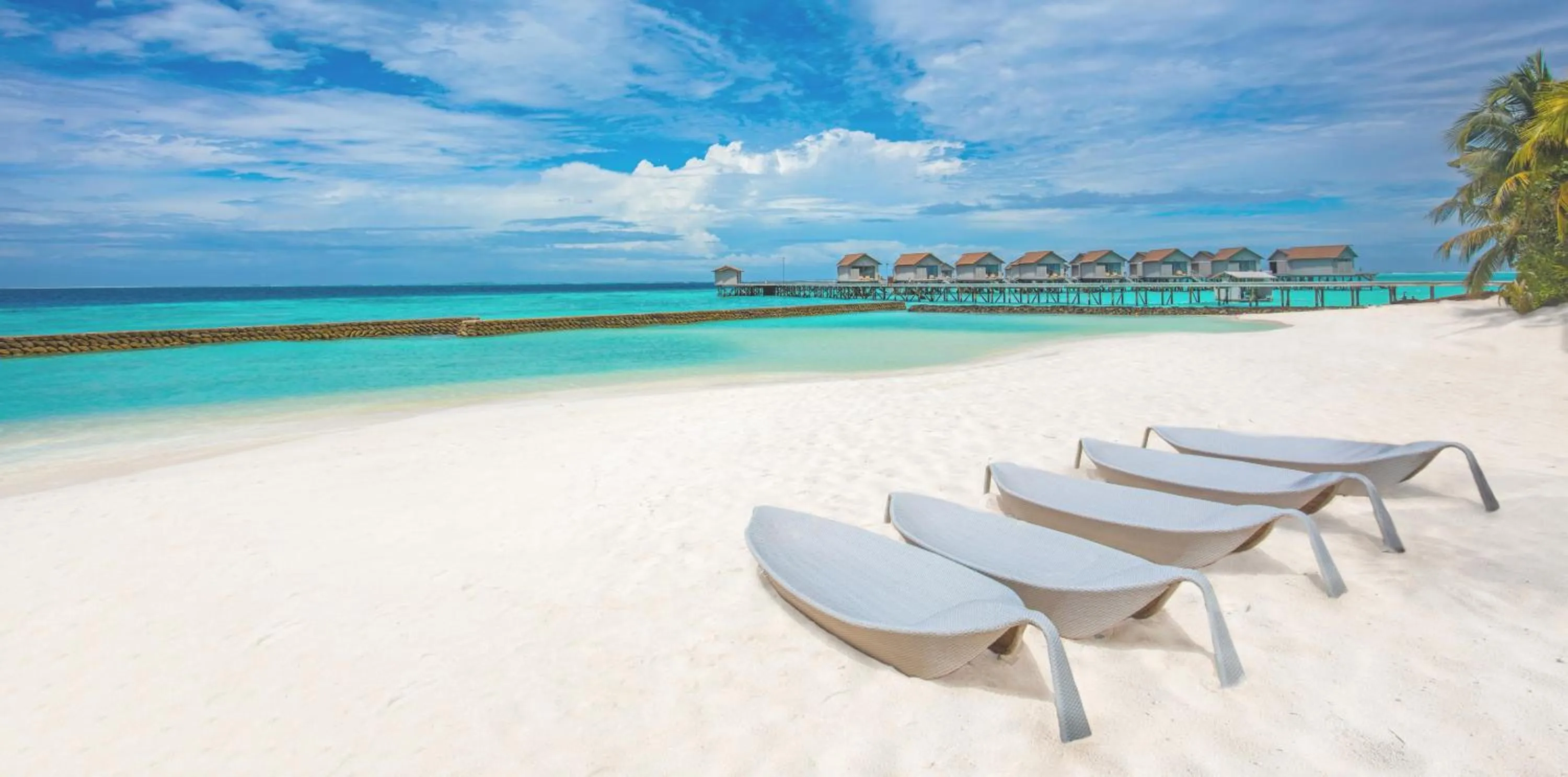 Beach in Centara Ras Fushi Resort & Spa Maldives - 50 percent discount on transfers for min 4 nights stay and more, valid for reservations between 11th Feb till 22 Dec 2025