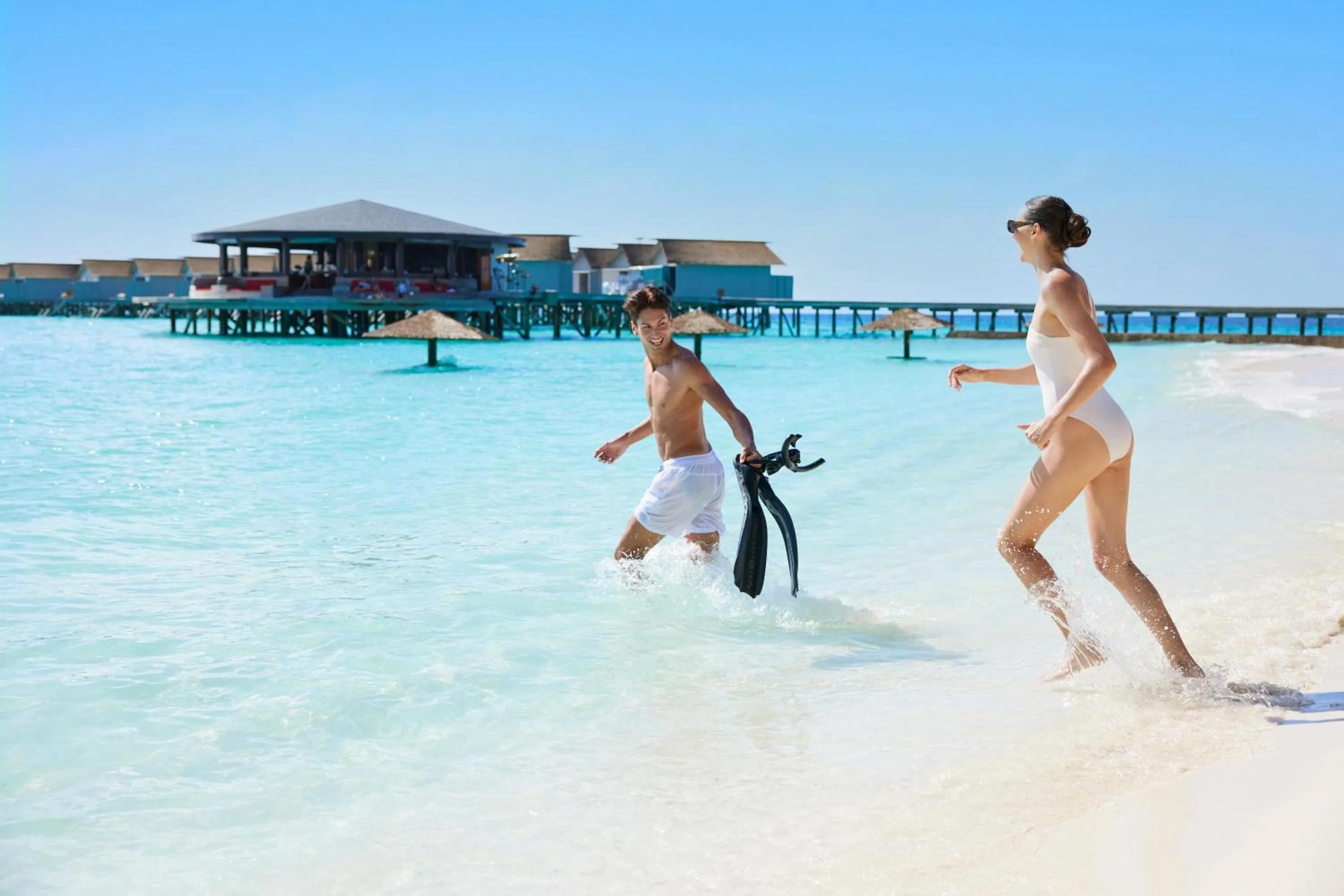 Beach in Centara Ras Fushi Resort & Spa Maldives - 50 percent discount on transfers for min 4 nights stay and more, valid for reservations between 11th Feb till 22 Dec 2025