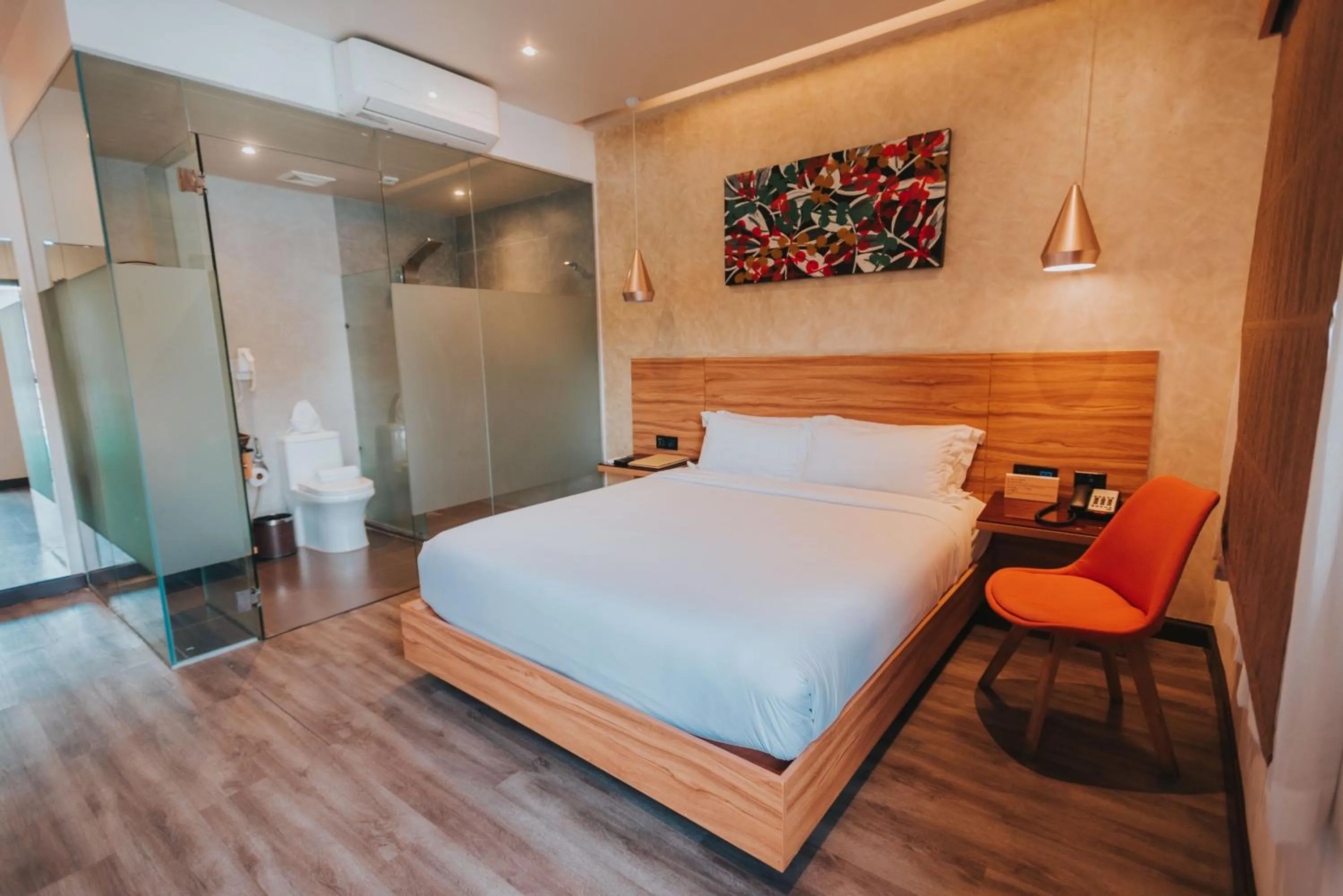 Bed in SureStay Plus Hotel by Best Western AC LUXE Angeles City