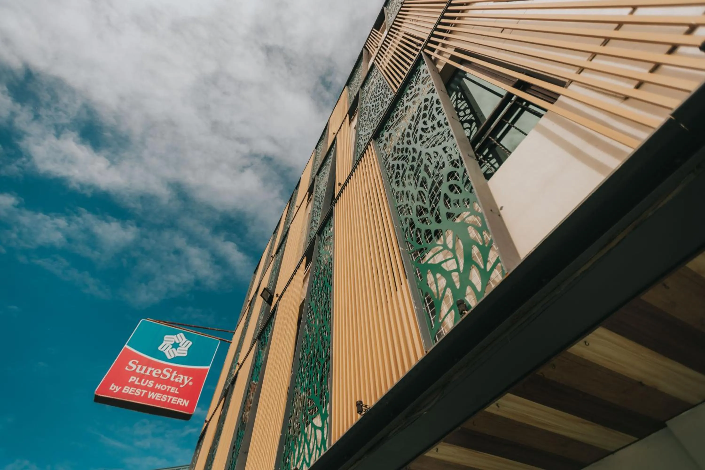 Property logo or sign in SureStay Plus Hotel by Best Western AC LUXE Angeles City