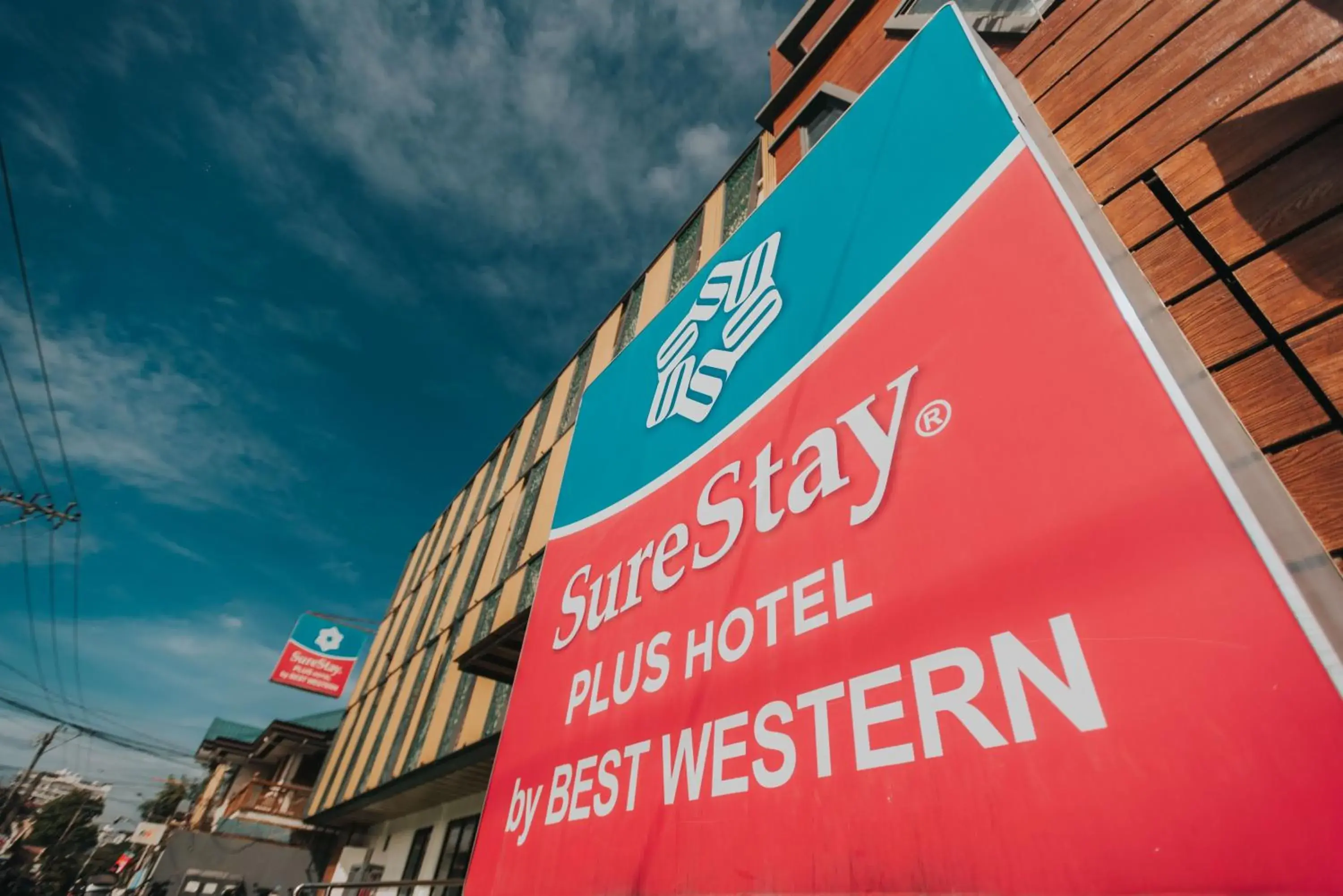Property building in SureStay Plus Hotel by Best Western AC LUXE Angeles City Property building in SureStay Plus Hotel by Best Western AC LUXE Angeles City