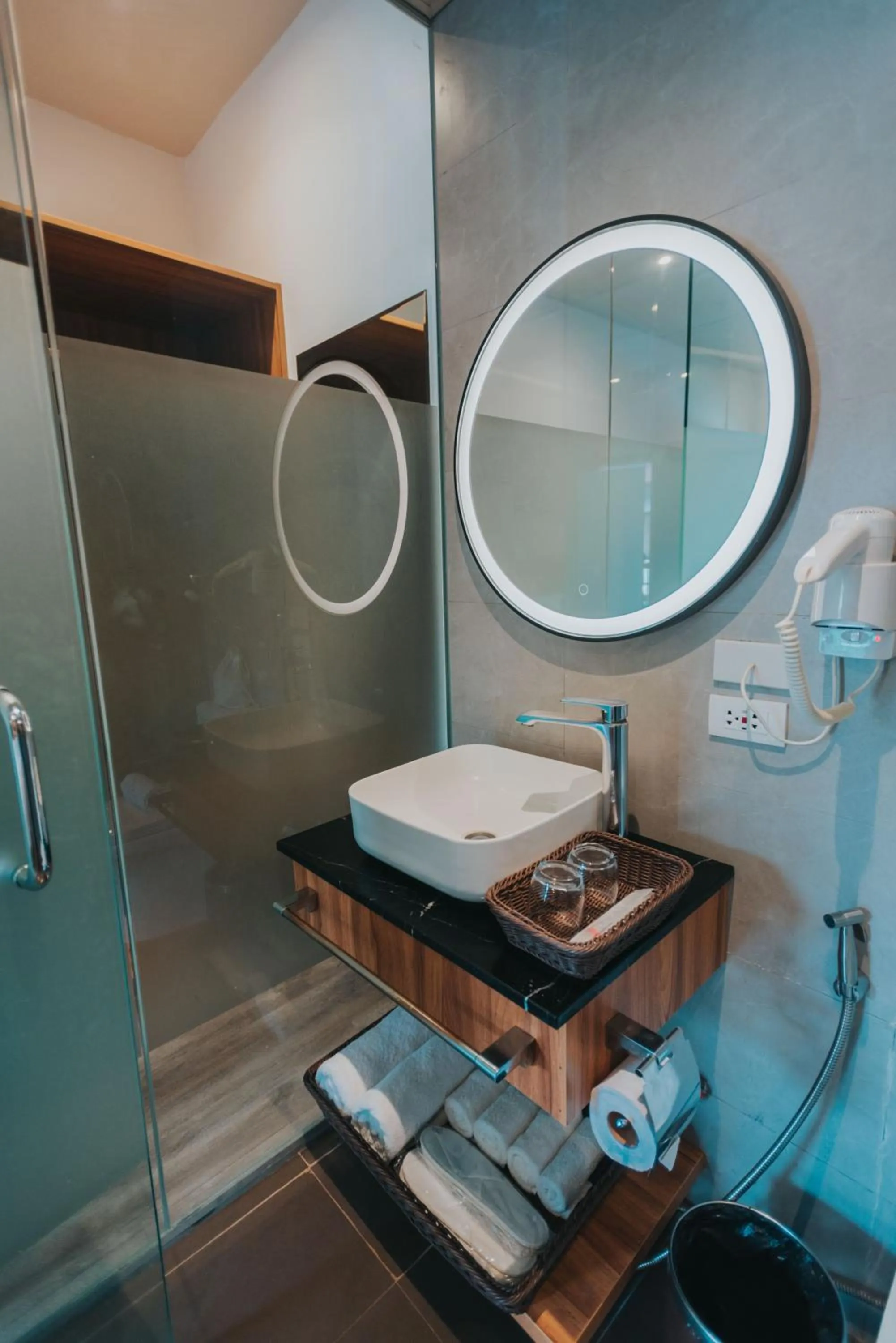 Bathroom in SureStay Plus Hotel by Best Western AC LUXE Angeles City