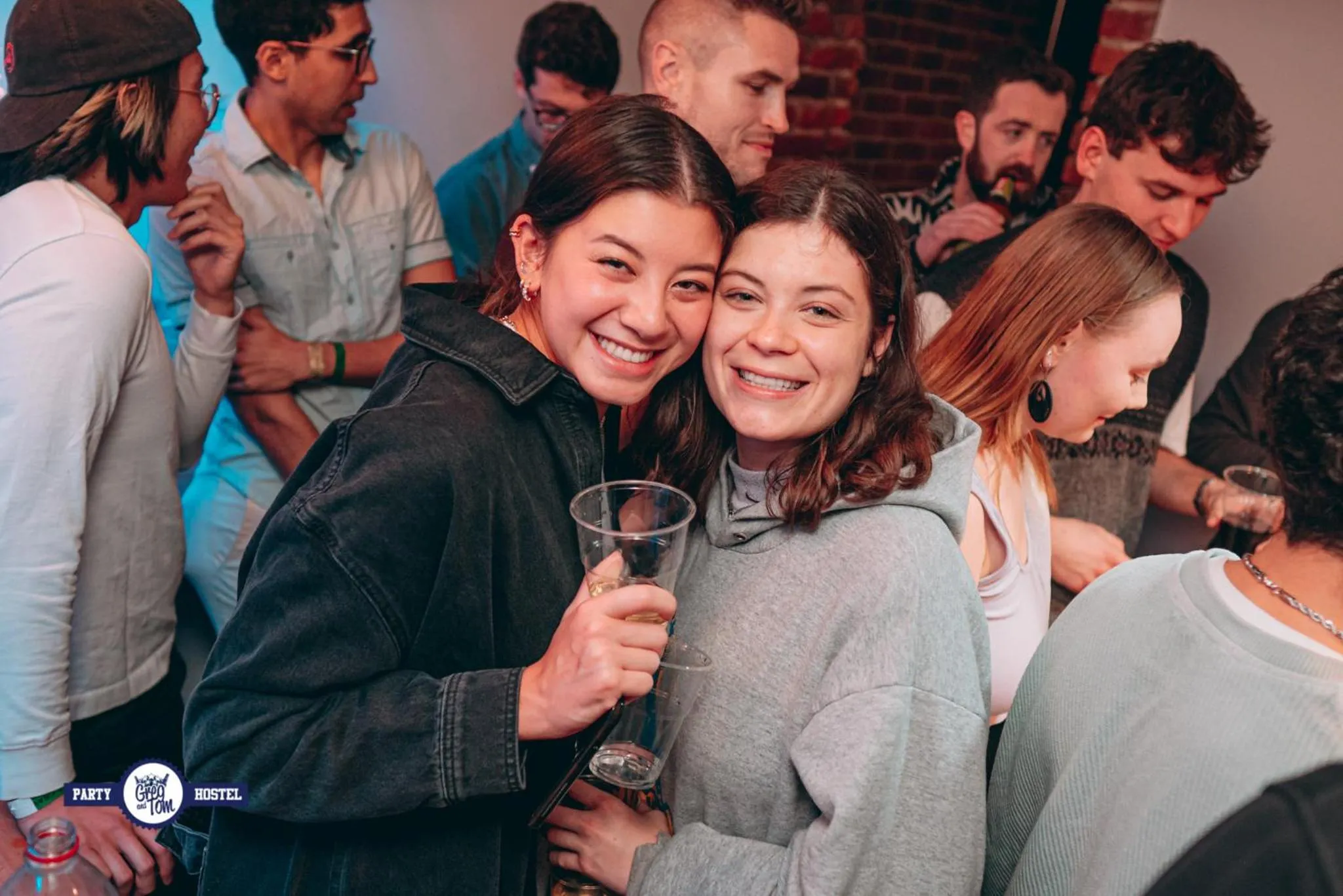 Communal lounge/ TV room in Greg&Tom Party Hostel