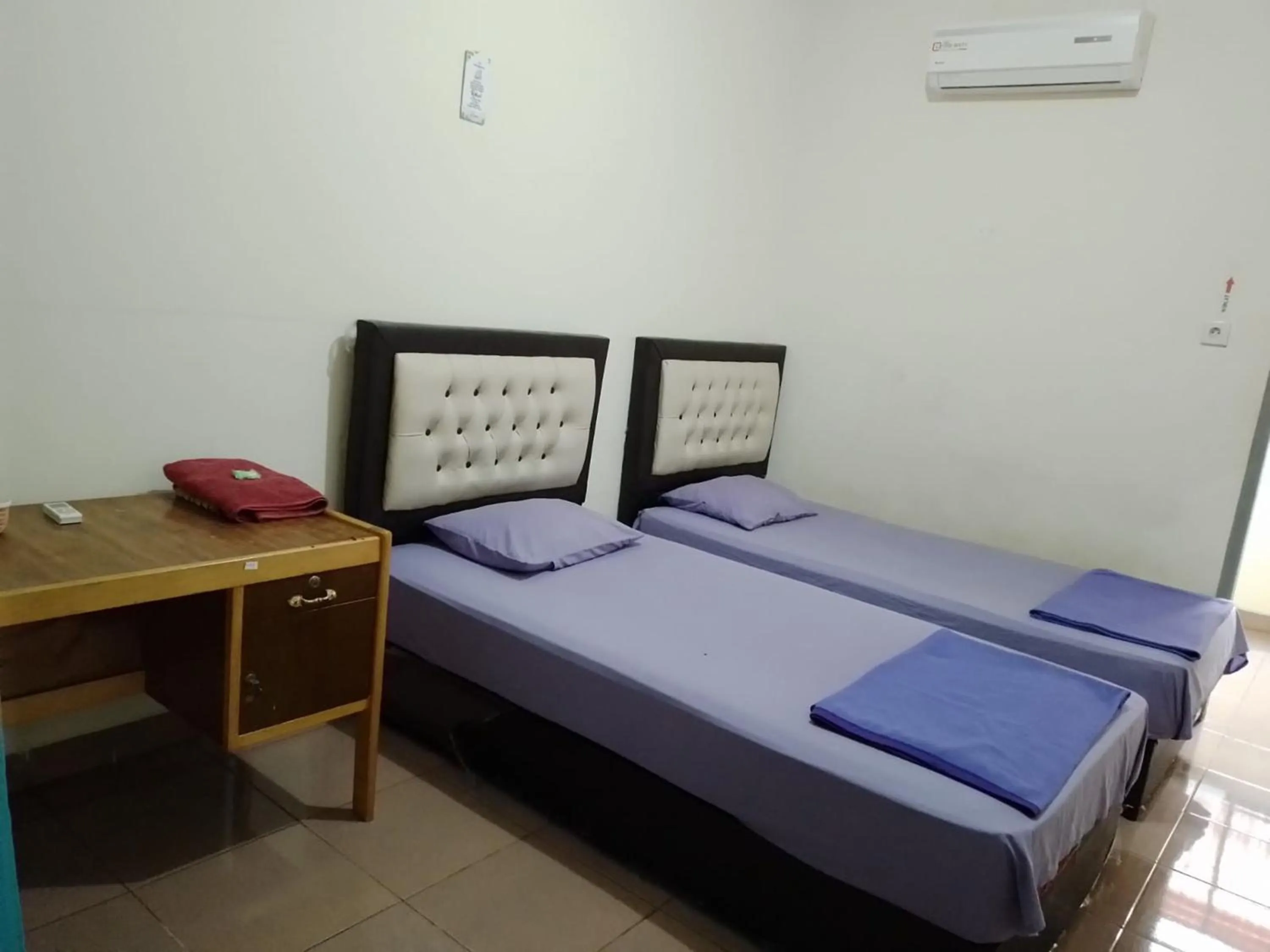 Bed in Penginapan Syariah