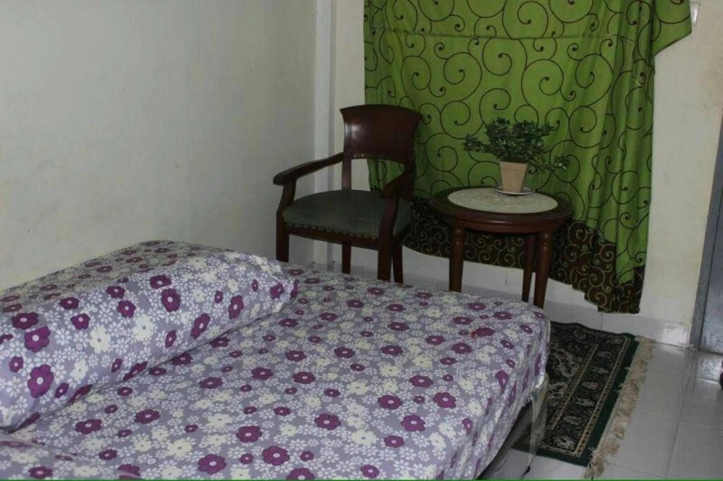 Seating area, Bed in Penginapan Syariah