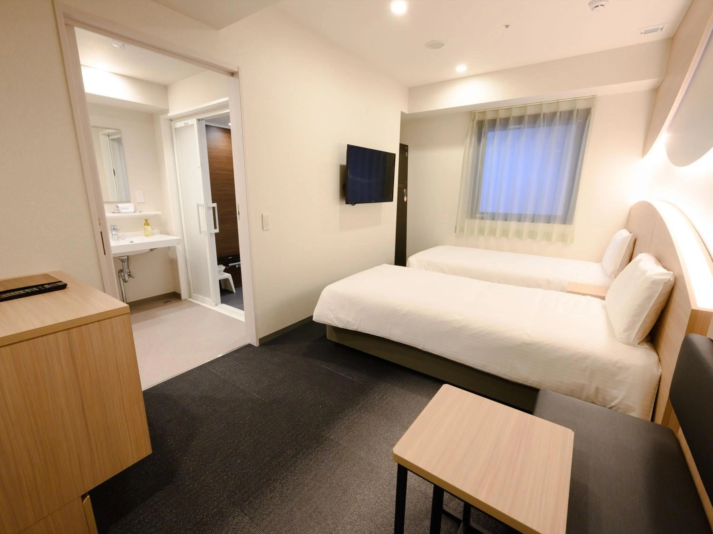 Bed in Henn na Hotel Premier Tokyo Asakusa Tawaramachi