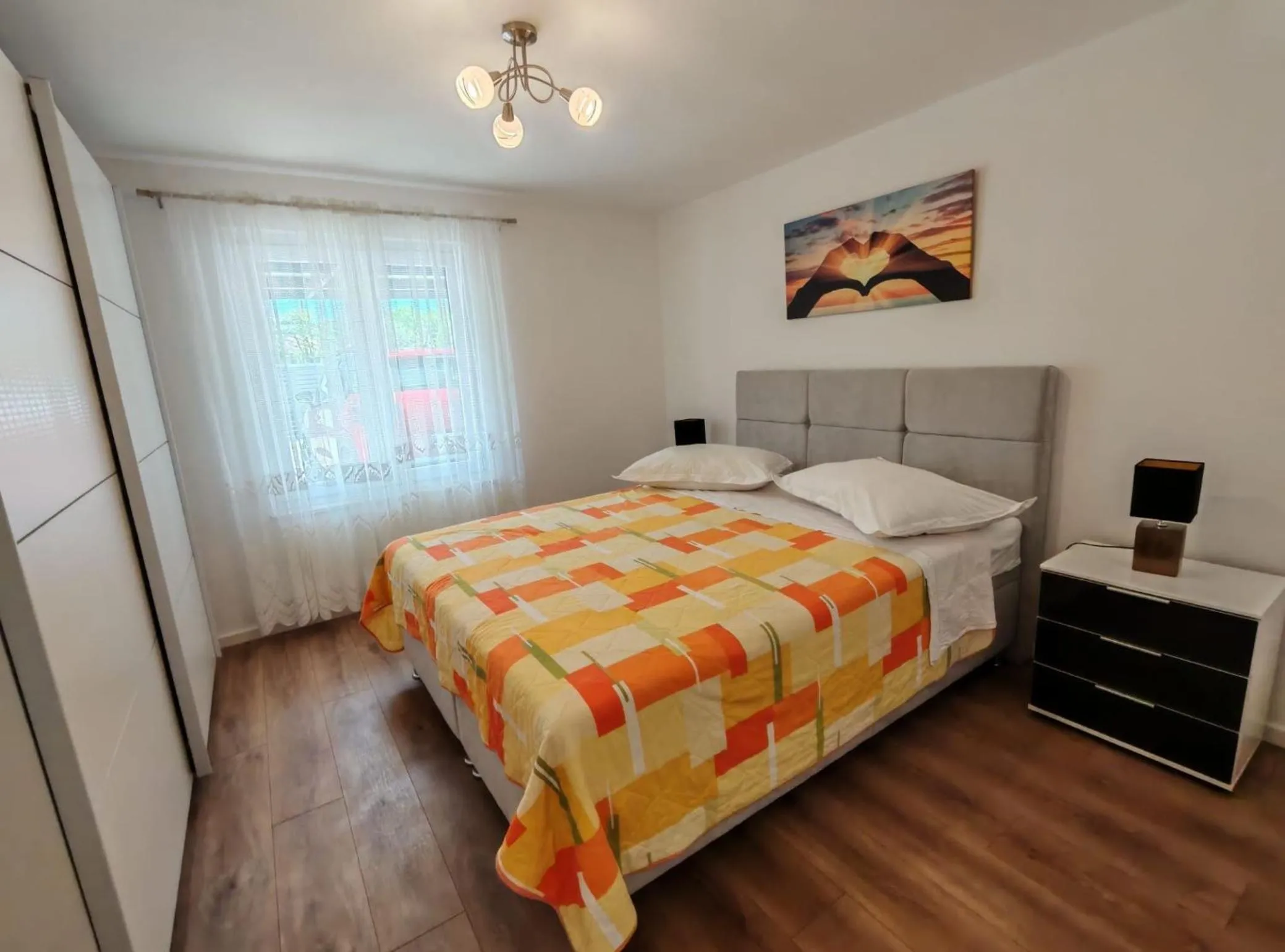 Bedroom, Bed in Apartments Mihovilovic - 50 m from beach