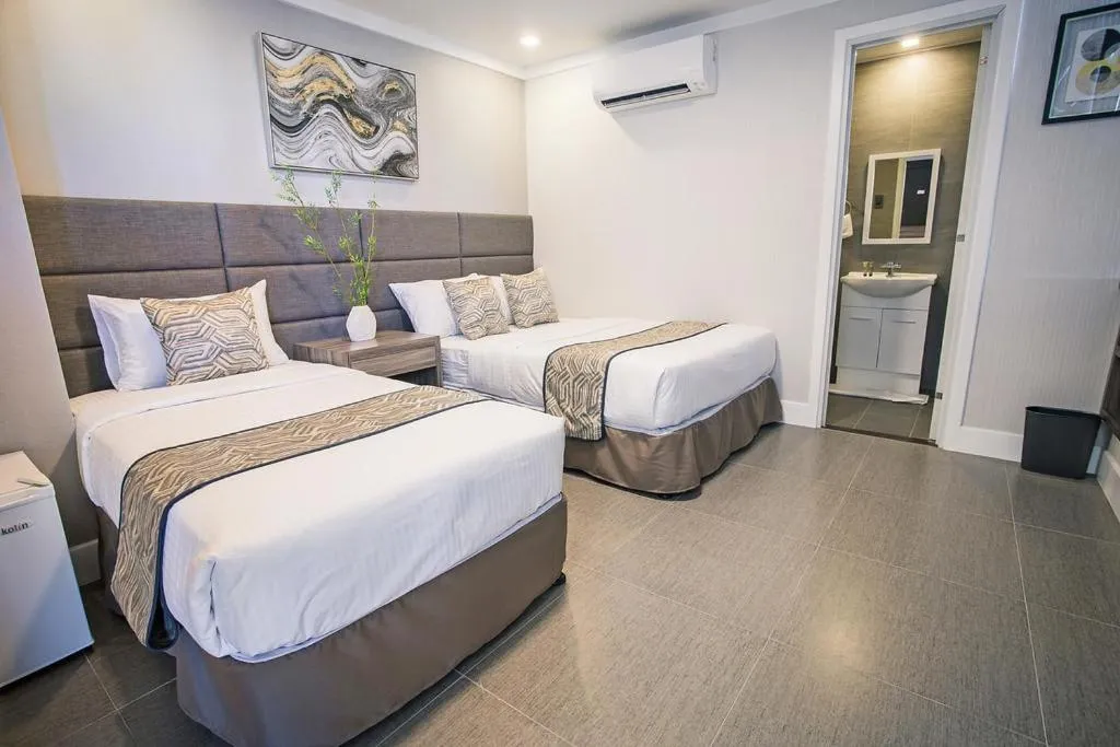 Bed in Anika Suites