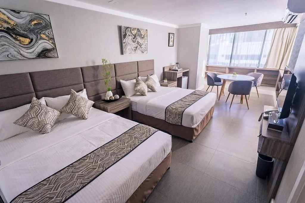 Bed in Anika Suites